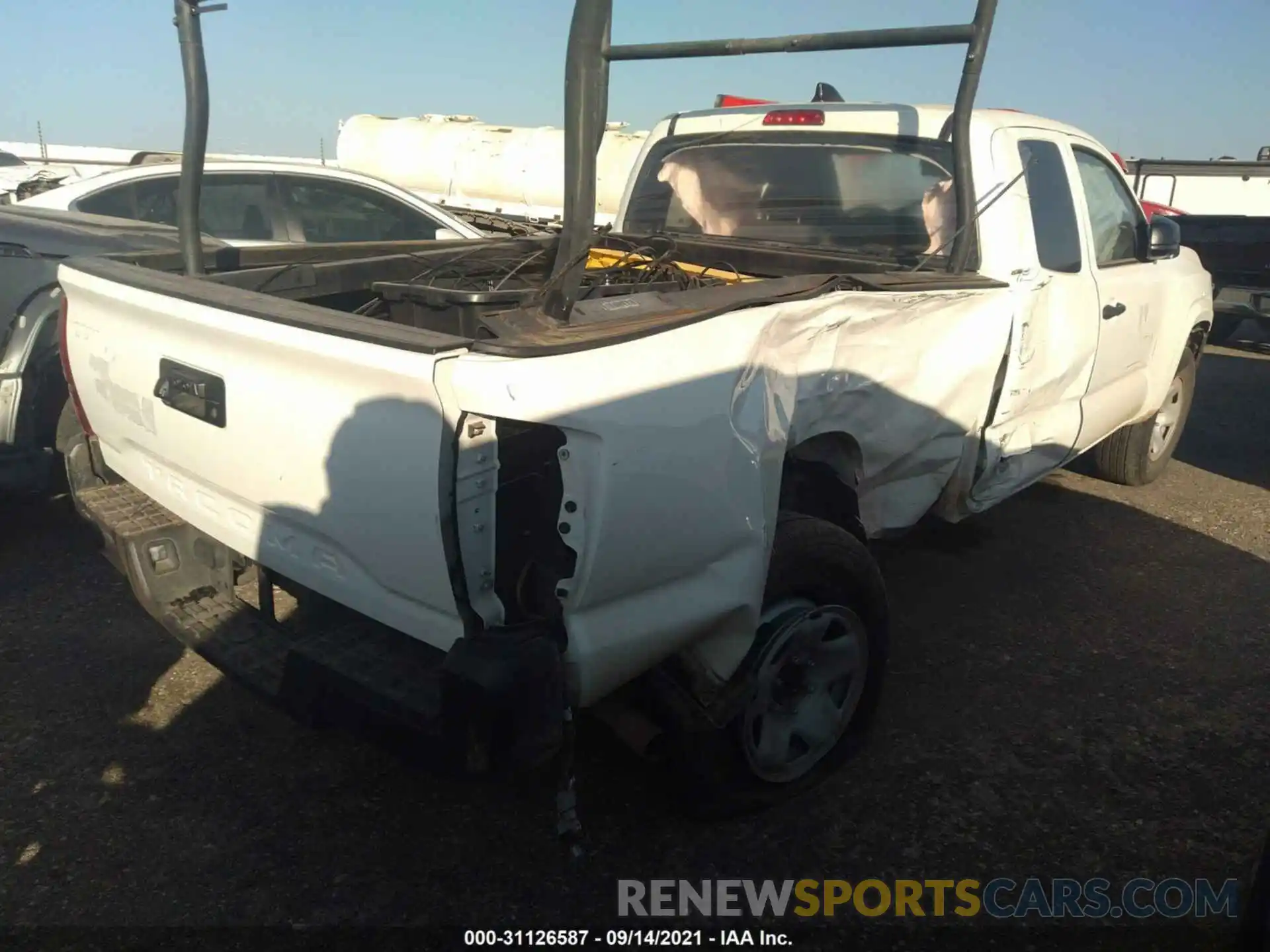 4 Photograph of a damaged car 3TYRX5GN2MT006648 TOYOTA TACOMA 2WD 2021