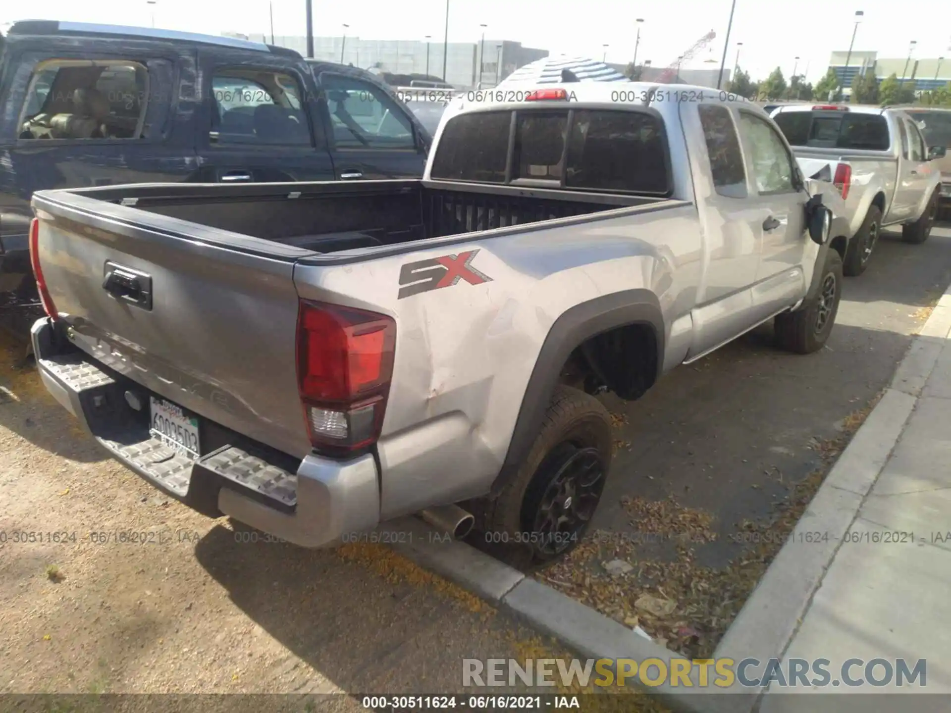 4 Photograph of a damaged car 3TYRX5GN4MT009972 TOYOTA TACOMA 2WD 2021