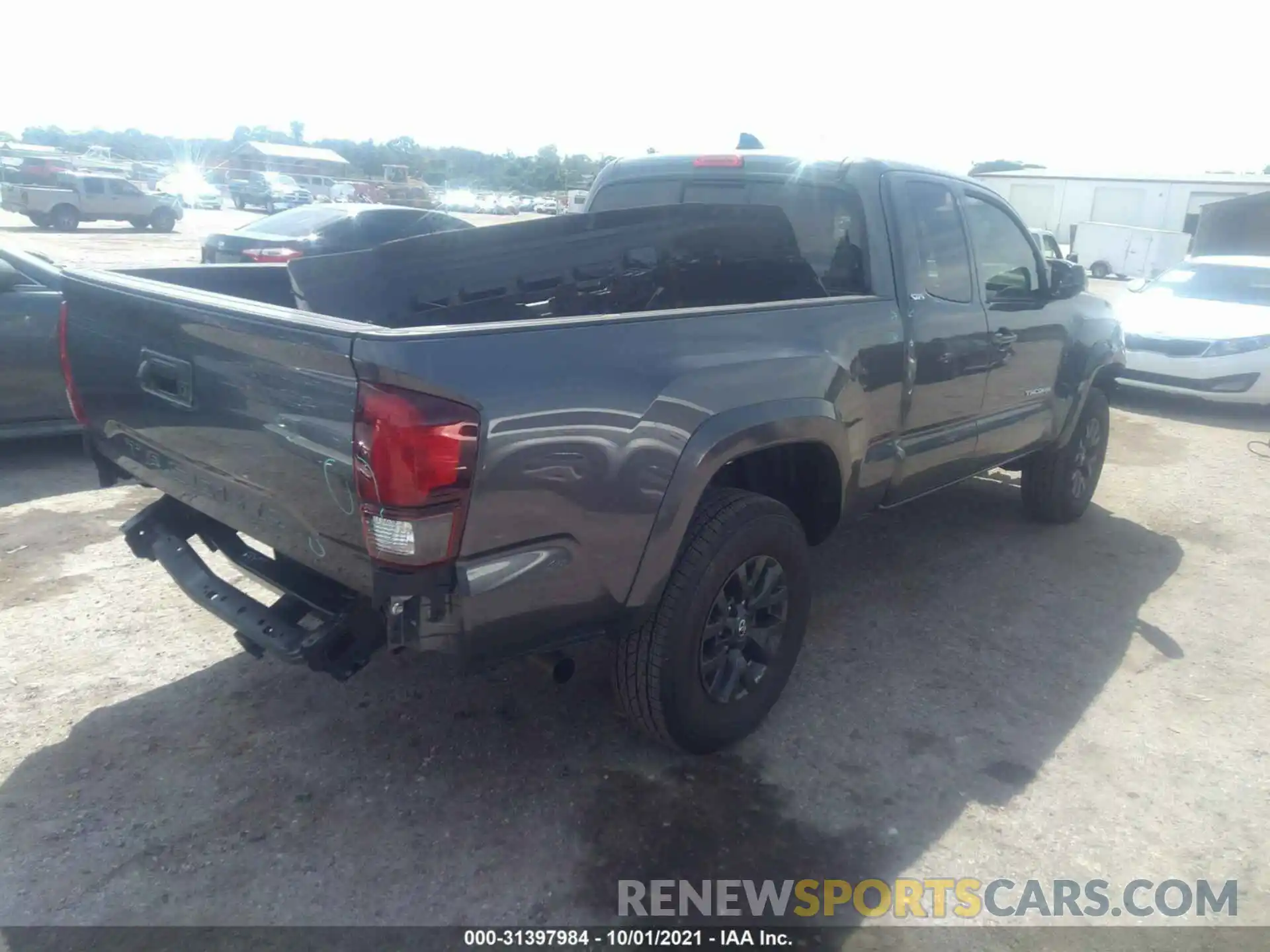 4 Photograph of a damaged car 3TYRX5GN5MT026974 TOYOTA TACOMA 2WD 2021