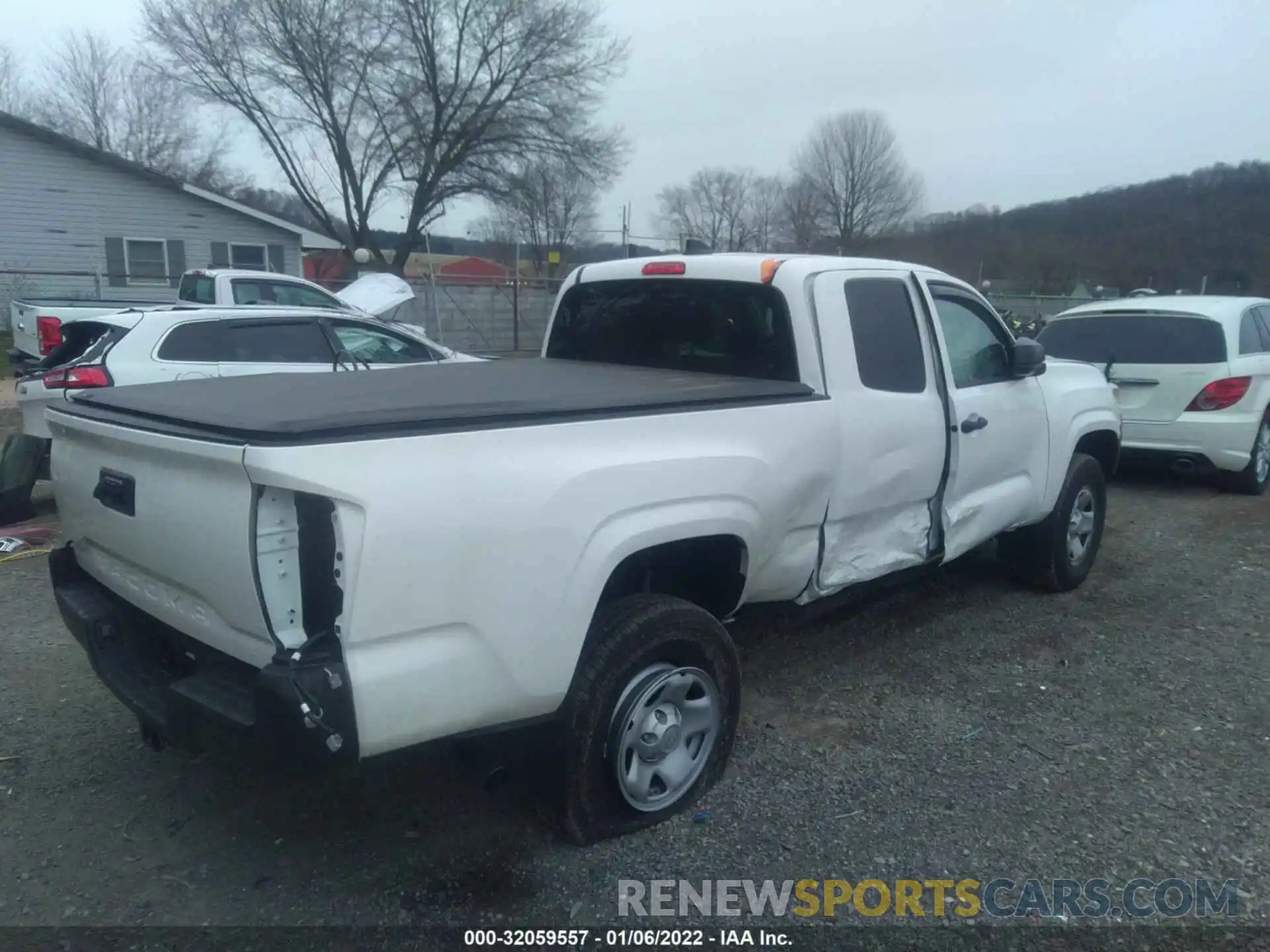 4 Photograph of a damaged car 3TYRX5GN5MT027638 TOYOTA TACOMA 2WD 2021