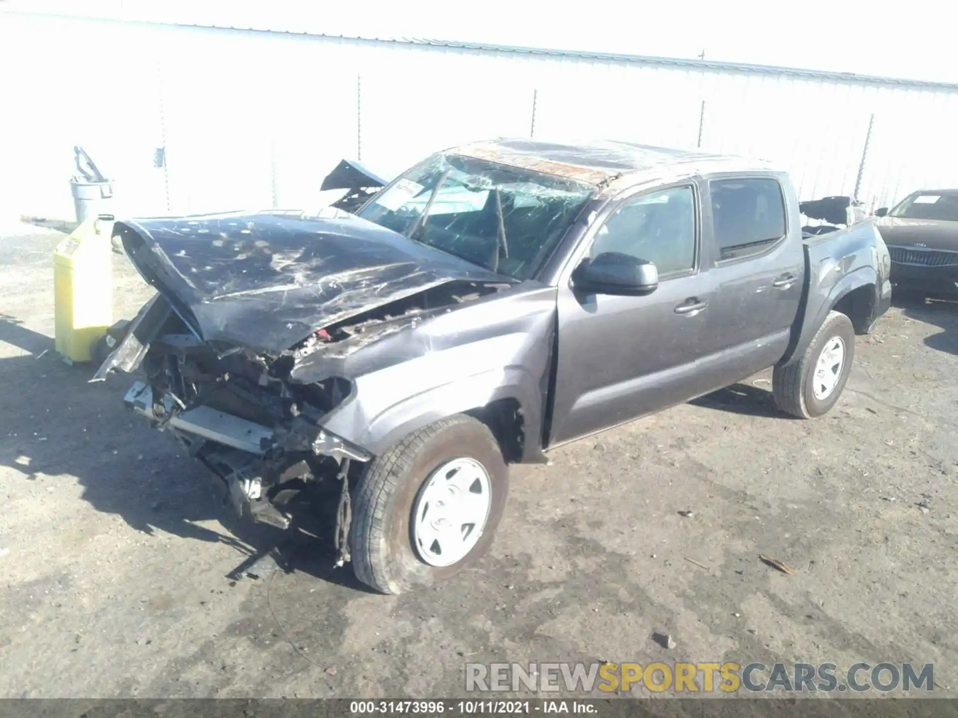 2 Photograph of a damaged car 5TFAX5GN1MX193237 TOYOTA TACOMA 2WD 2021