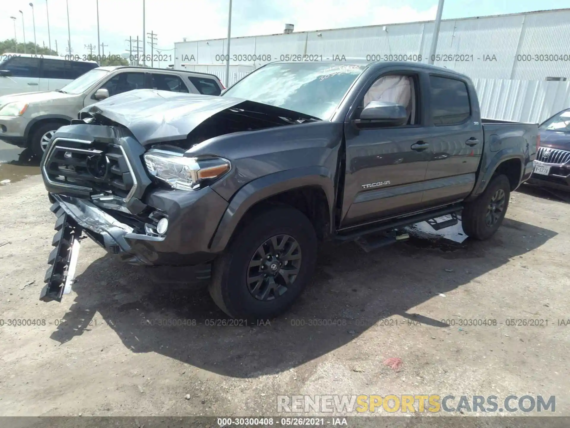 2 Photograph of a damaged car 5TFAX5GN1MX193920 TOYOTA TACOMA 2WD 2021