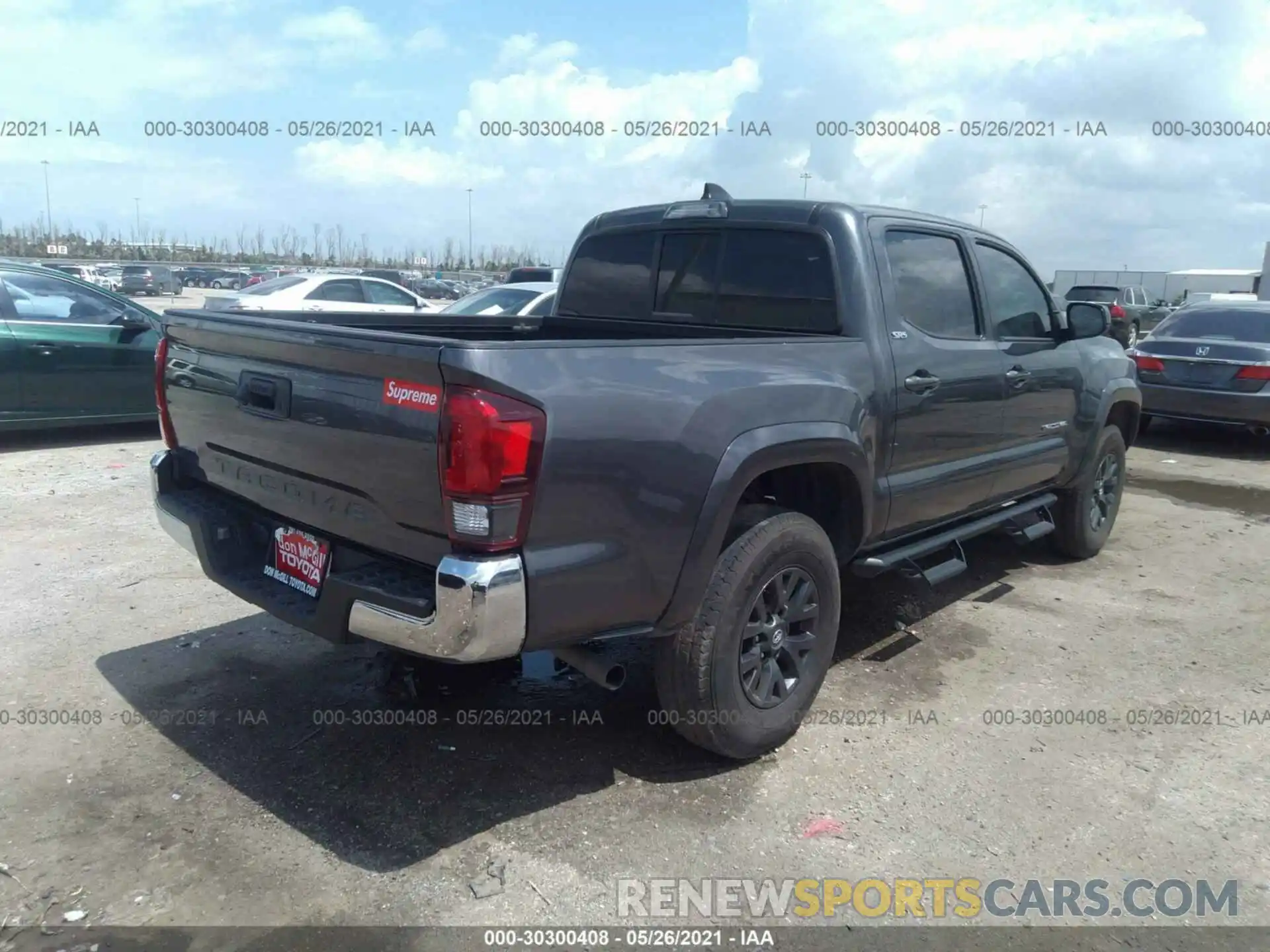 4 Photograph of a damaged car 5TFAX5GN1MX193920 TOYOTA TACOMA 2WD 2021