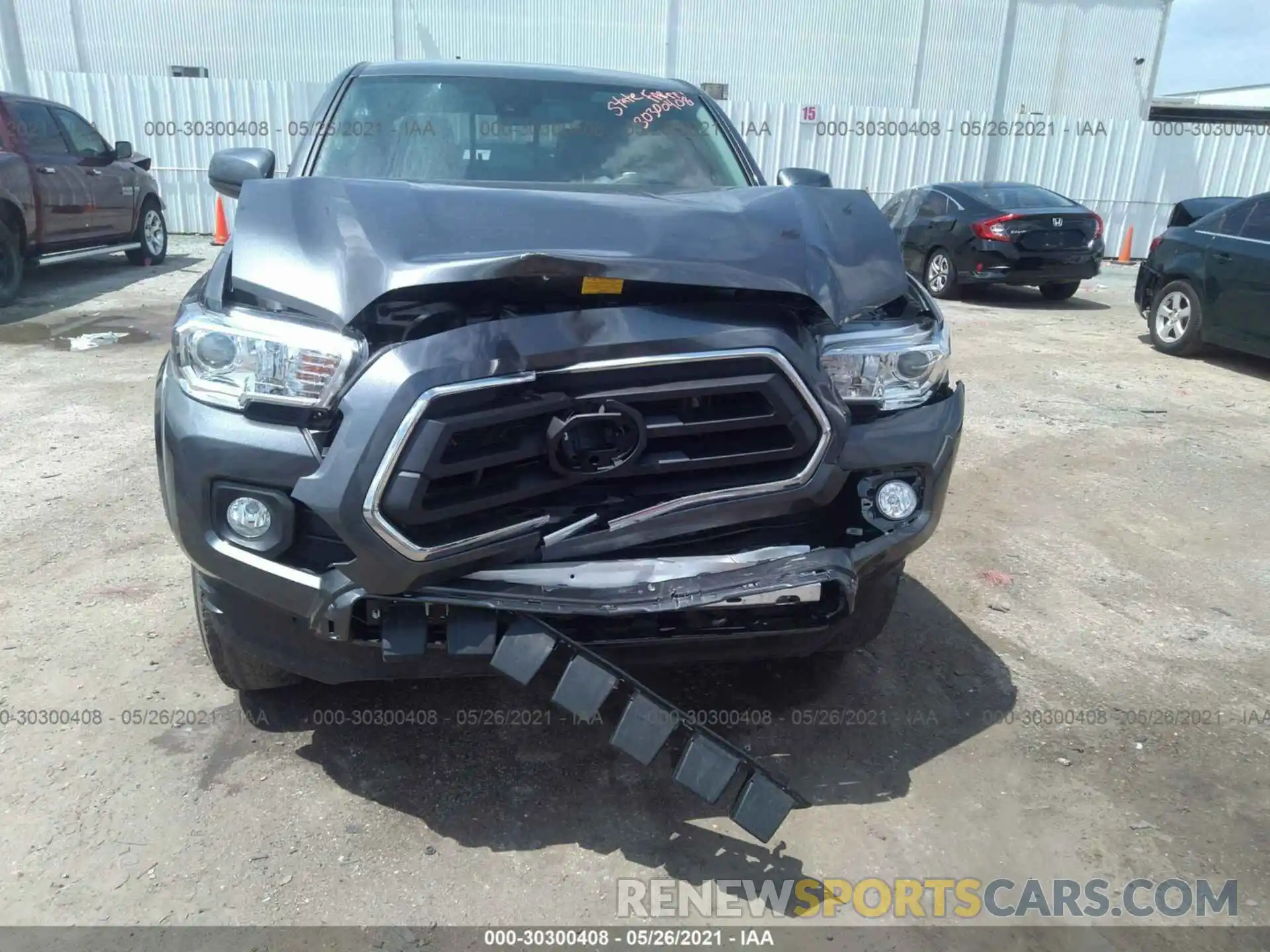 6 Photograph of a damaged car 5TFAX5GN1MX193920 TOYOTA TACOMA 2WD 2021