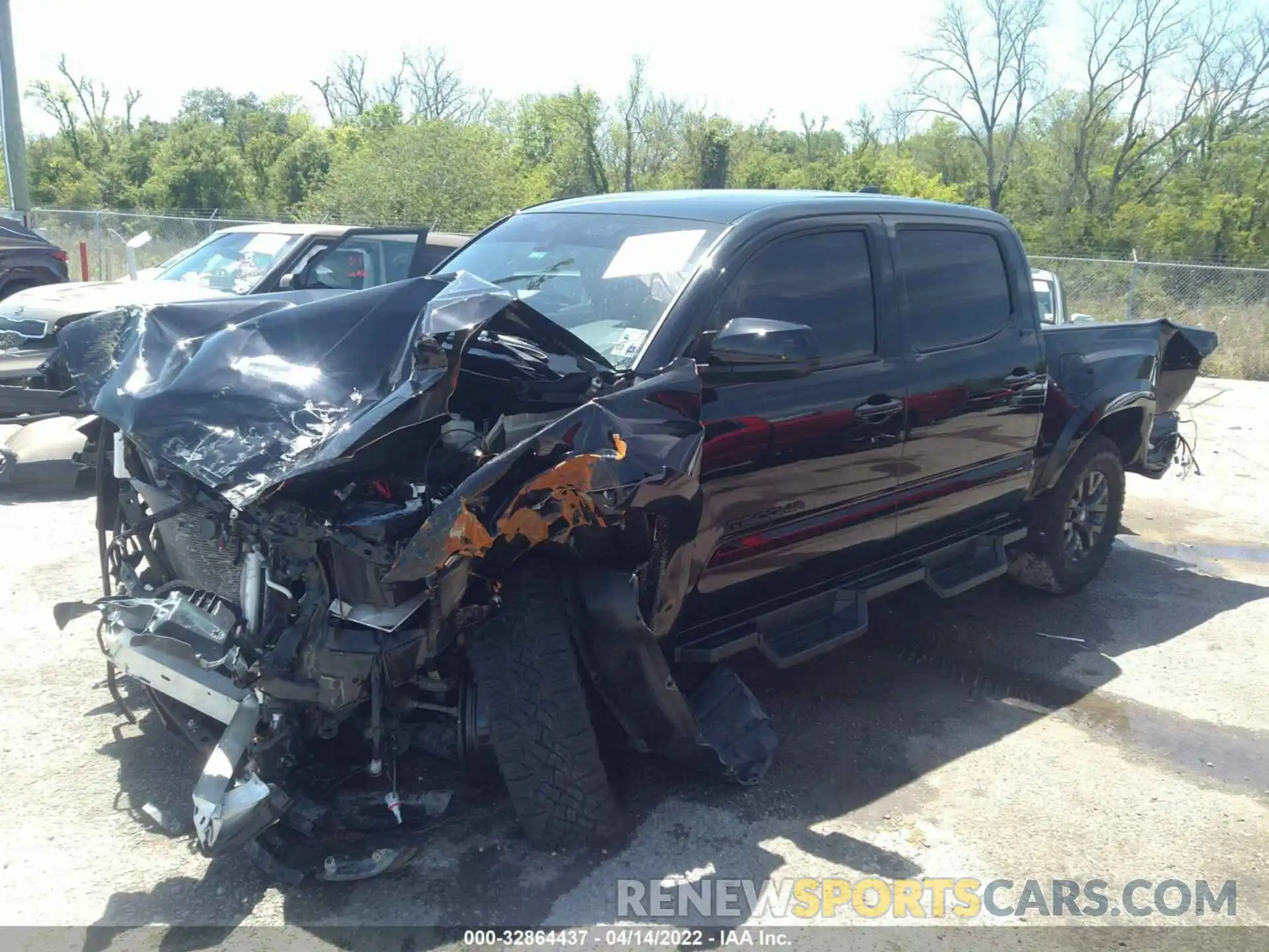 2 Photograph of a damaged car 5TFAX5GN1MX194128 TOYOTA TACOMA 2WD 2021