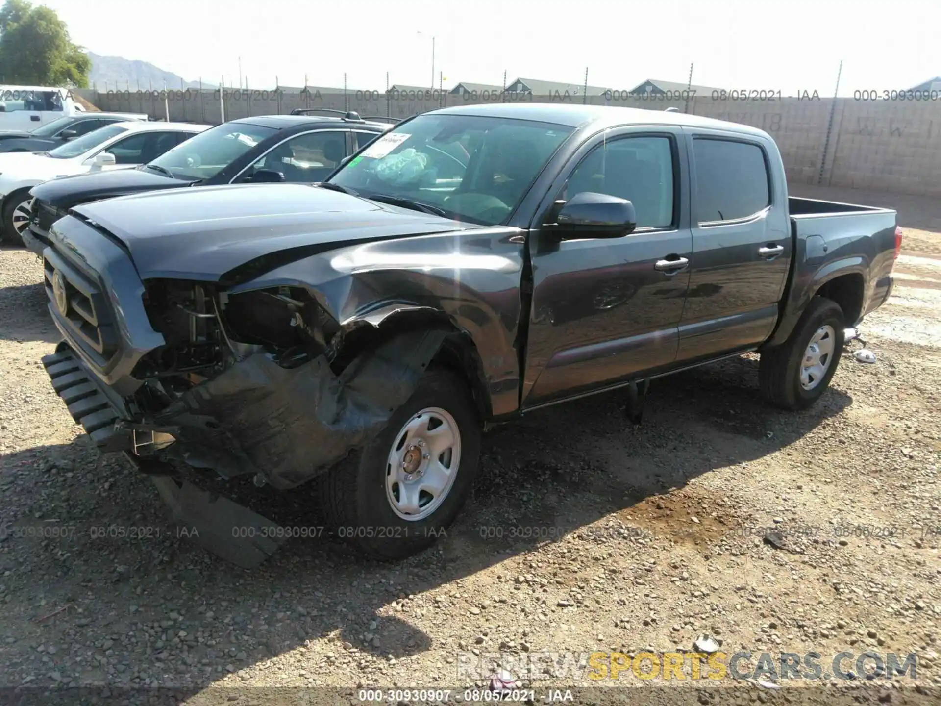 2 Photograph of a damaged car 5TFAX5GN1MX194713 TOYOTA TACOMA 2WD 2021