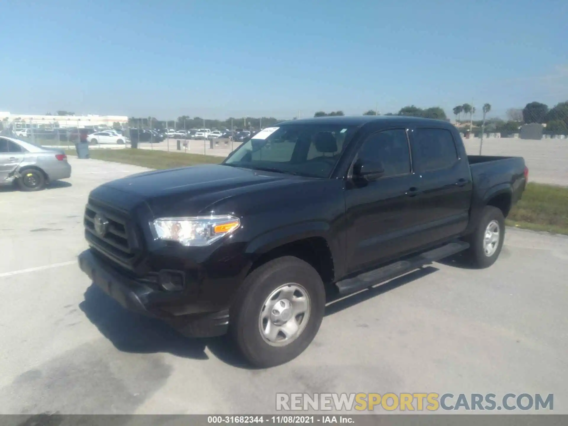 2 Photograph of a damaged car 5TFAX5GN5MX193936 TOYOTA TACOMA 2WD 2021