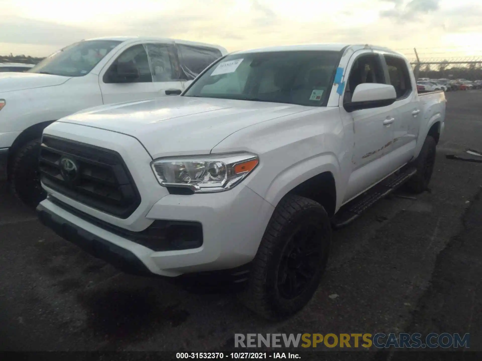 2 Photograph of a damaged car 5TFAX5GN7MX190357 TOYOTA TACOMA 2WD 2021