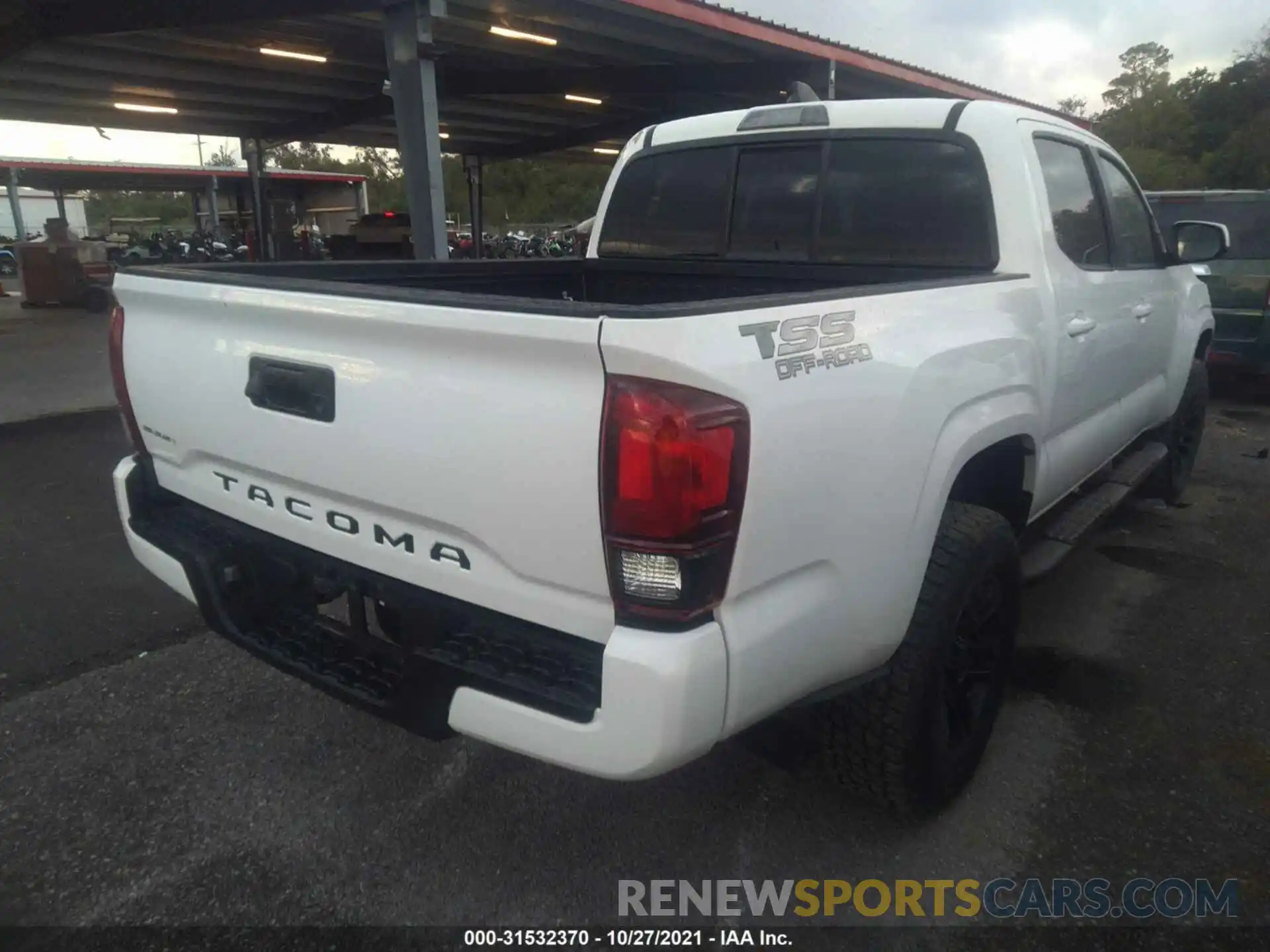 4 Photograph of a damaged car 5TFAX5GN7MX190357 TOYOTA TACOMA 2WD 2021