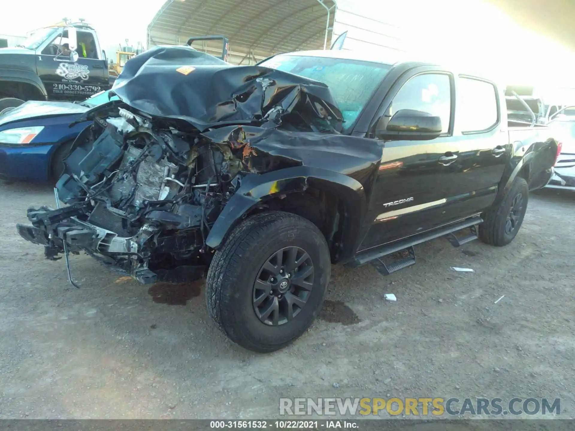 2 Photograph of a damaged car 5TFAX5GN8MX189511 TOYOTA TACOMA 2WD 2021