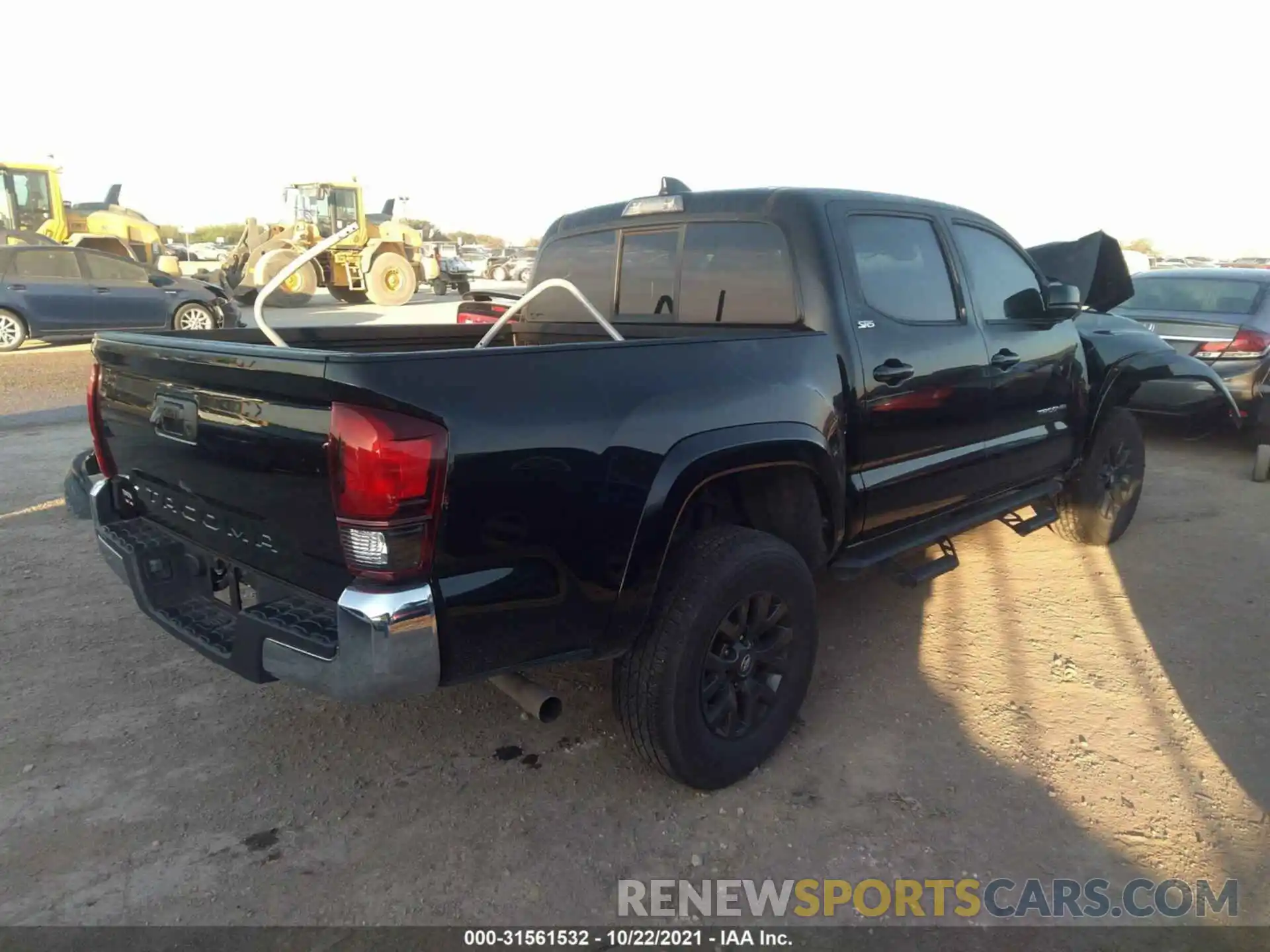 4 Photograph of a damaged car 5TFAX5GN8MX189511 TOYOTA TACOMA 2WD 2021