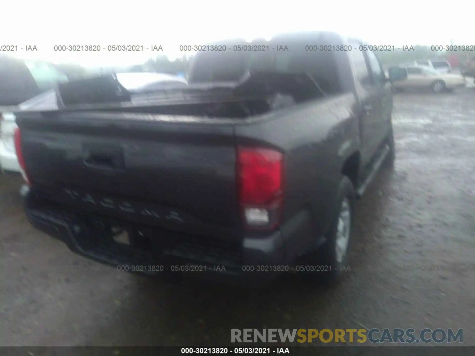 4 Photograph of a damaged car 5TFAX5GN8MX193722 TOYOTA TACOMA 2WD 2021