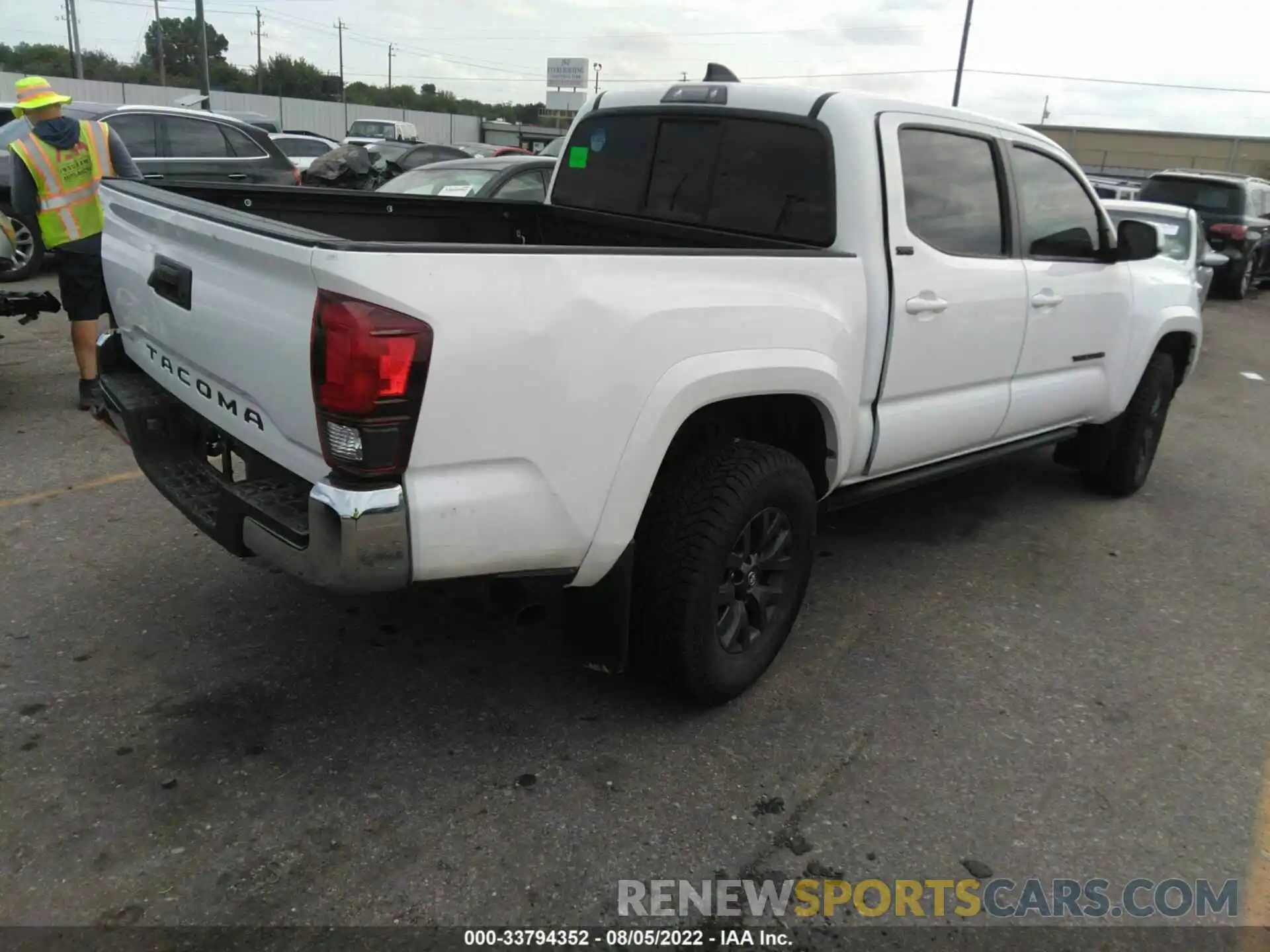 4 Photograph of a damaged car 5TFAX5GN8MX194398 TOYOTA TACOMA 2WD 2021