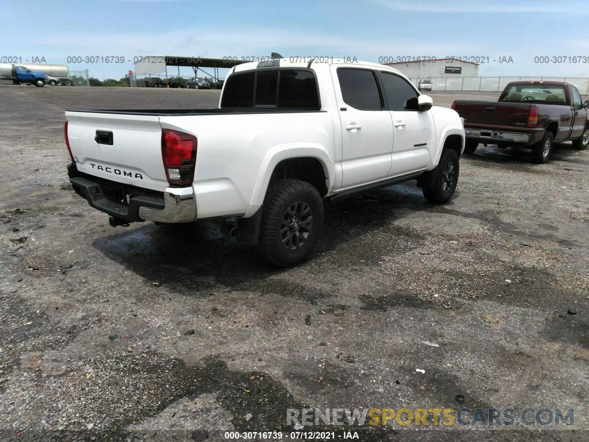 4 Photograph of a damaged car 5TFAX5GN9MX189114 TOYOTA TACOMA 2WD 2021