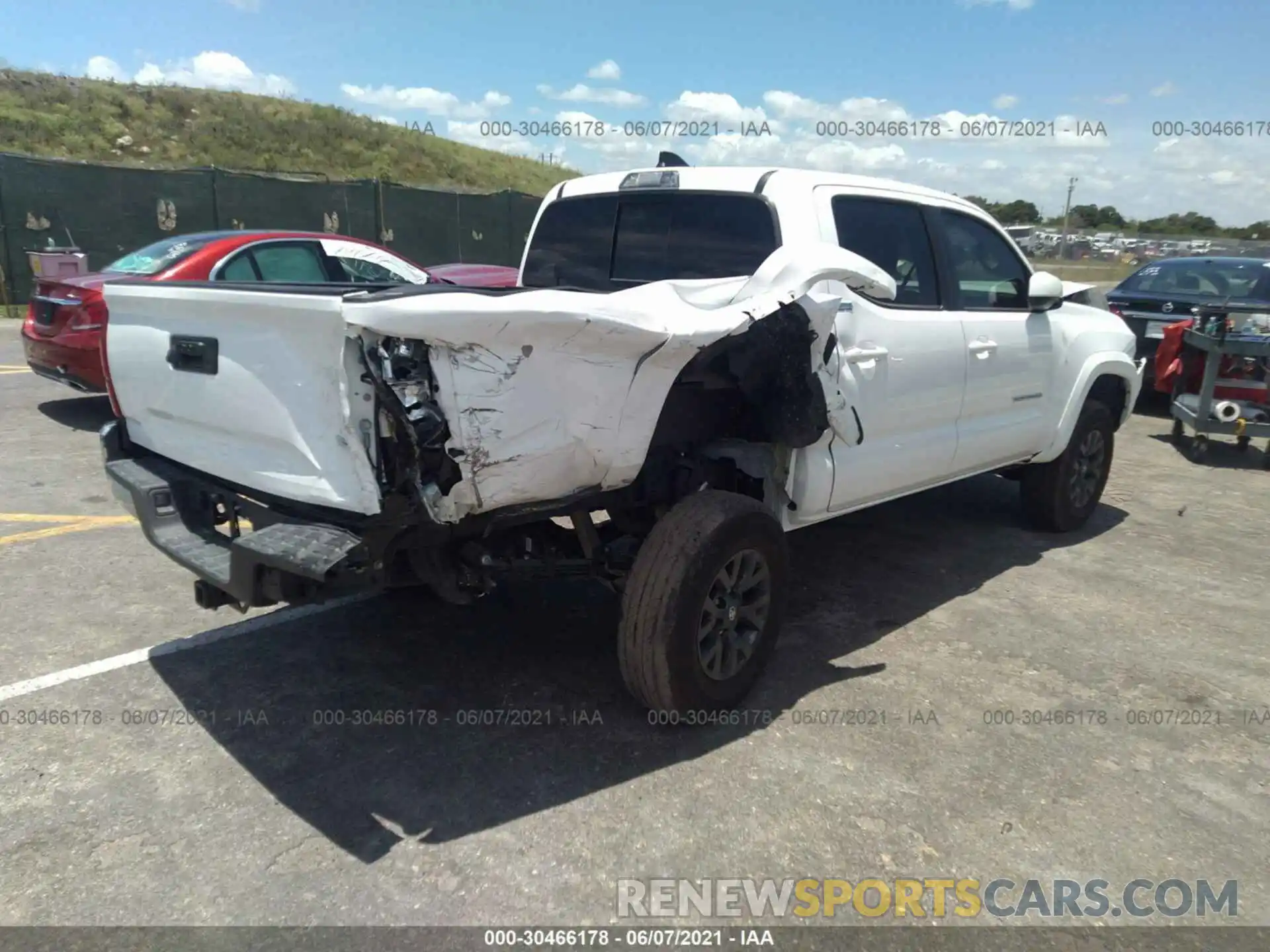 4 Photograph of a damaged car 5TFAZ5CN0MX095770 TOYOTA TACOMA 2WD 2021