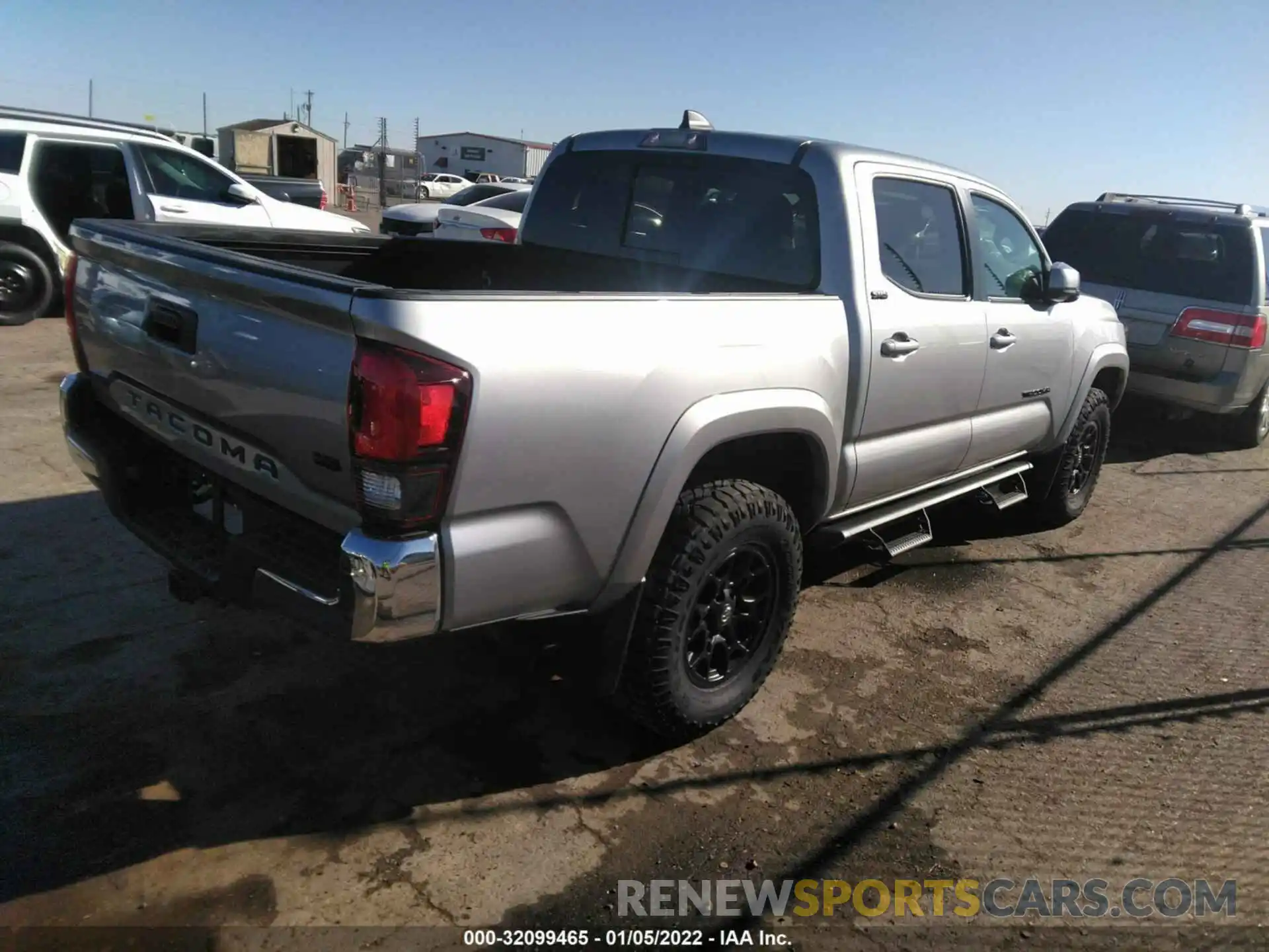 4 Photograph of a damaged car 5TFAZ5CN0MX095820 TOYOTA TACOMA 2WD 2021