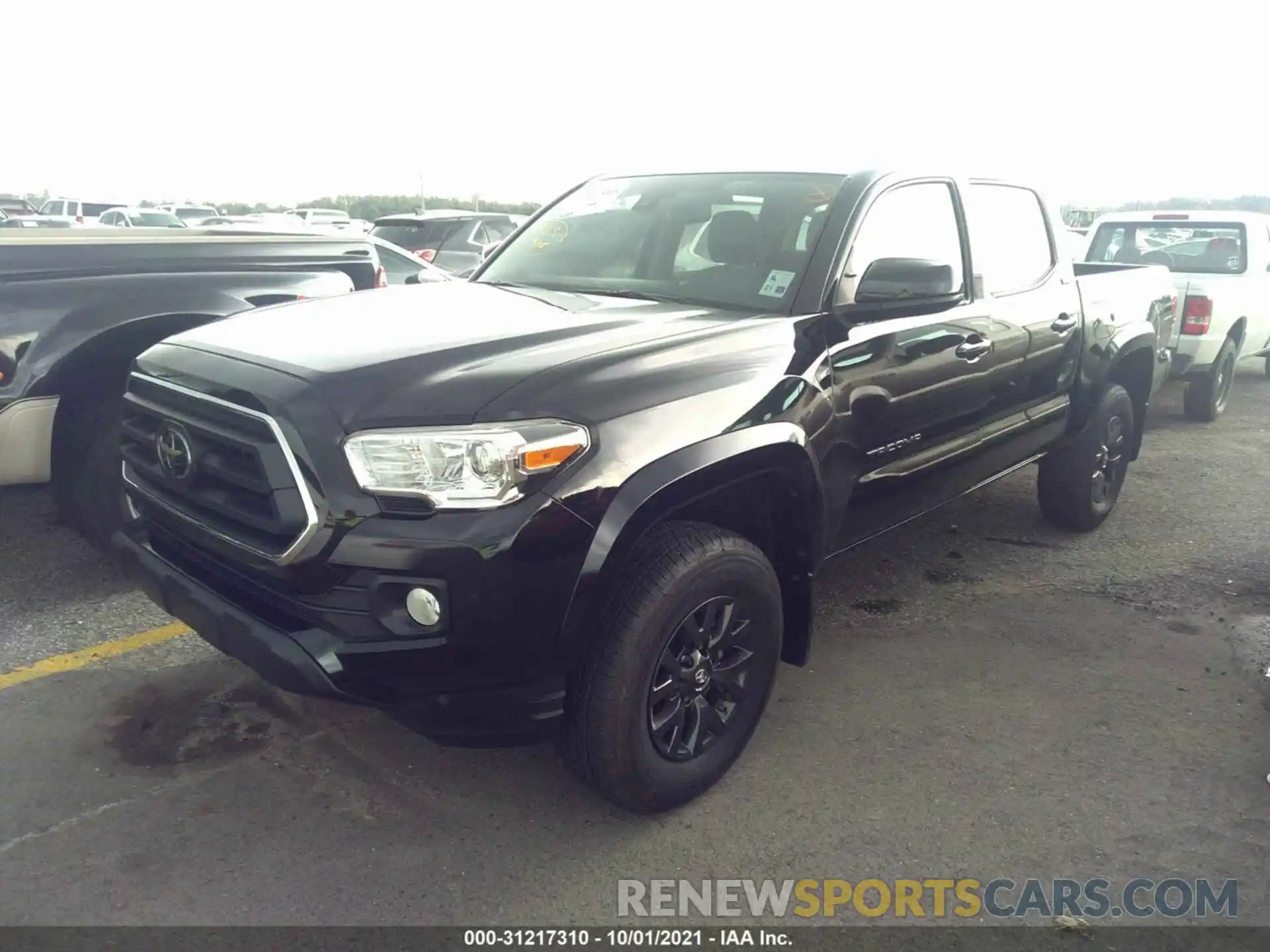 2 Photograph of a damaged car 5TFAZ5CN0MX096269 TOYOTA TACOMA 2WD 2021