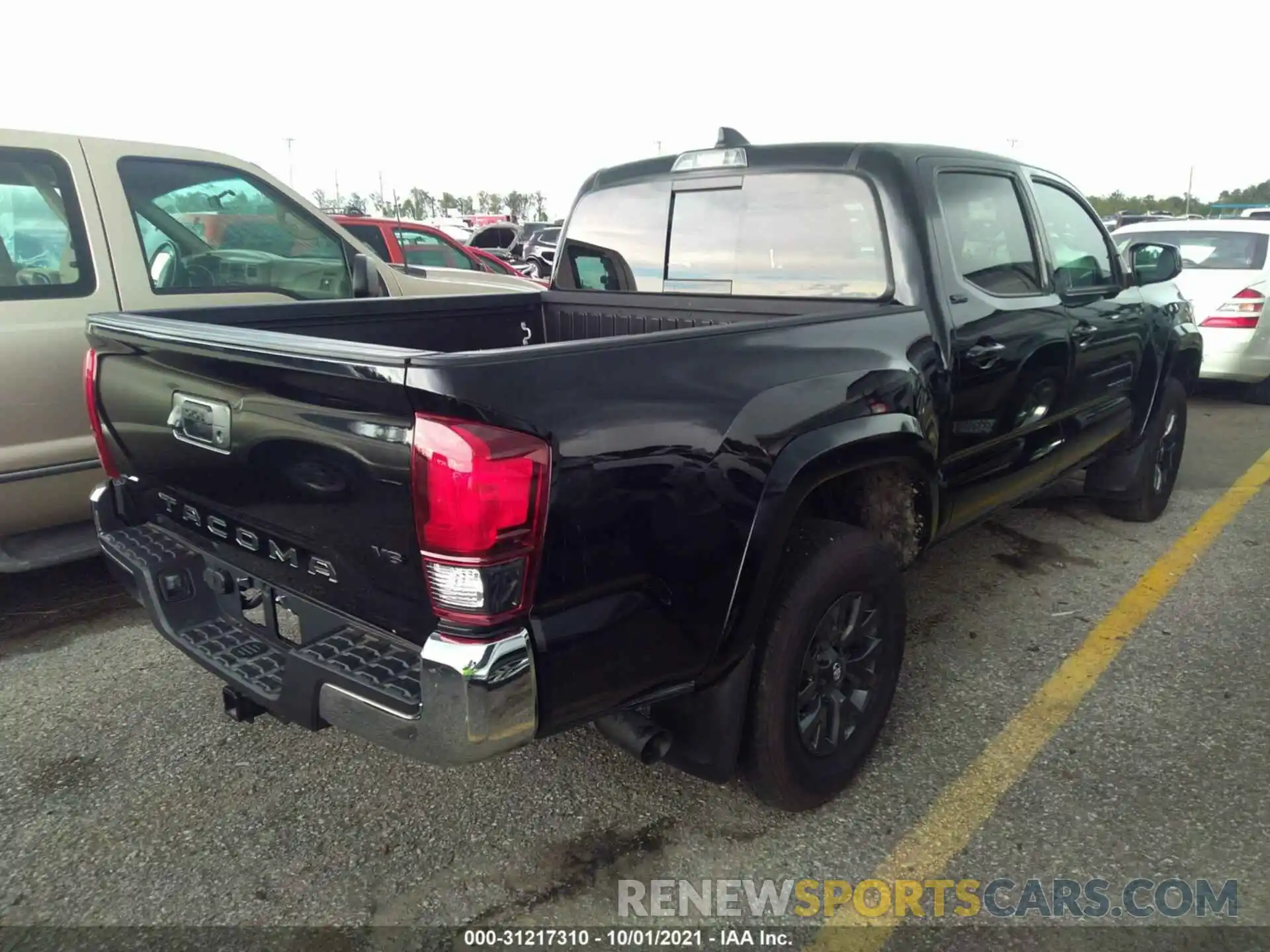 4 Photograph of a damaged car 5TFAZ5CN0MX096269 TOYOTA TACOMA 2WD 2021