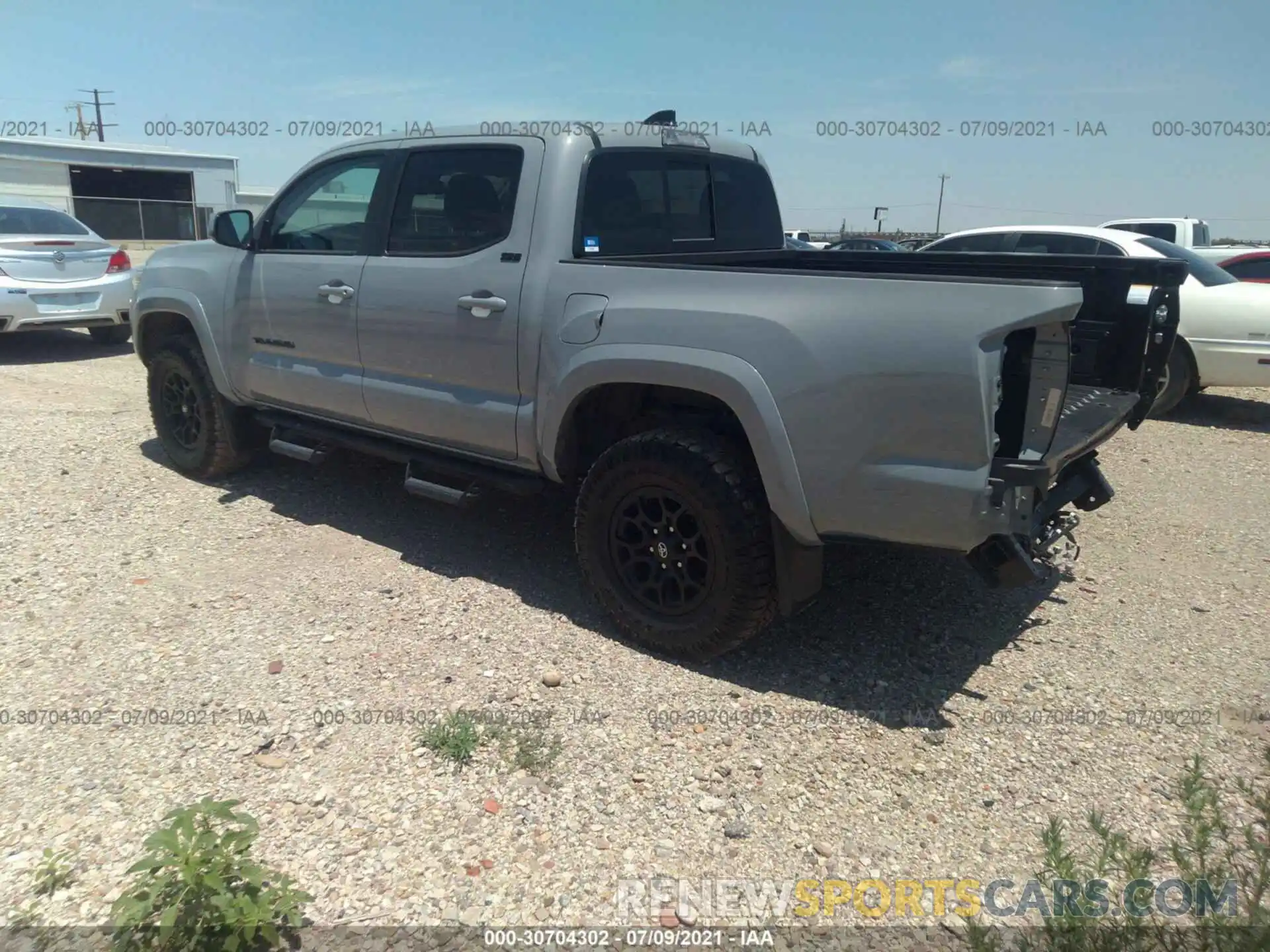 3 Photograph of a damaged car 5TFAZ5CN0MX101051 TOYOTA TACOMA 2WD 2021