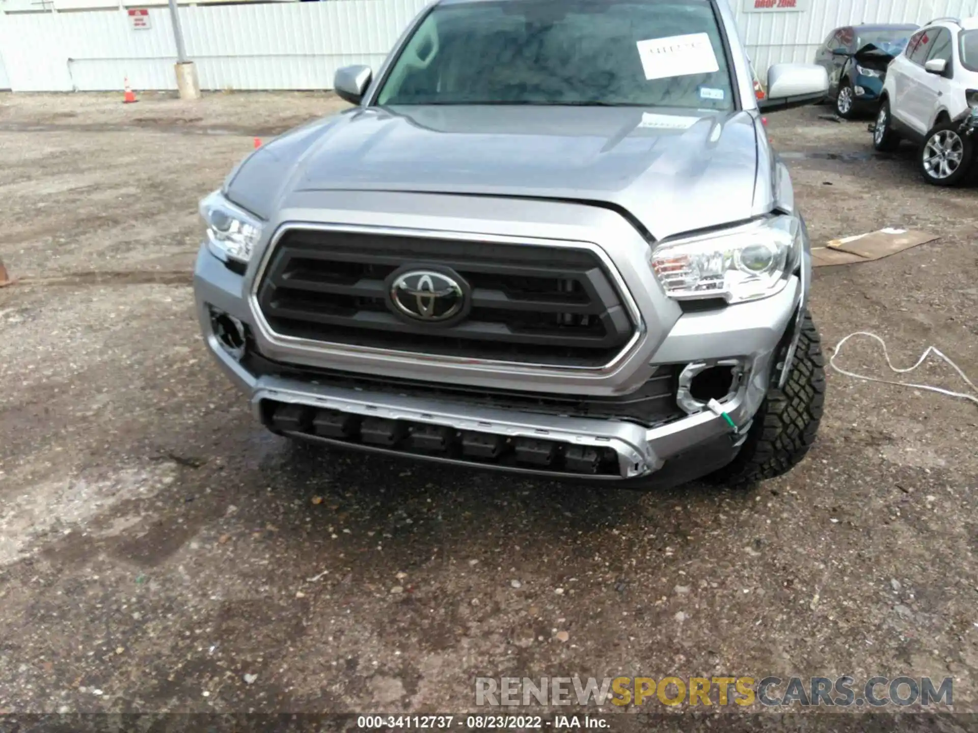 6 Photograph of a damaged car 5TFAZ5CN0MX117024 TOYOTA TACOMA 2WD 2021