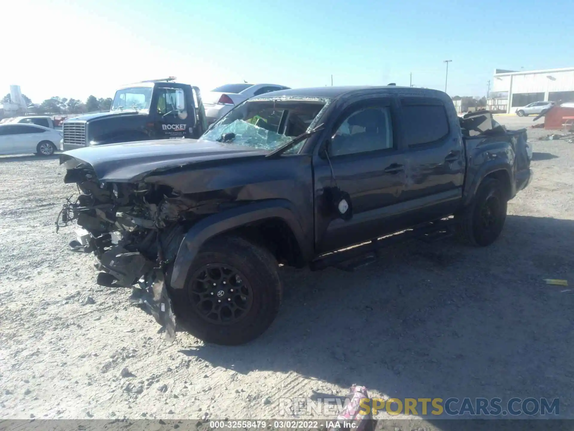 2 Photograph of a damaged car 5TFAZ5CN1MX100247 TOYOTA TACOMA 2WD 2021