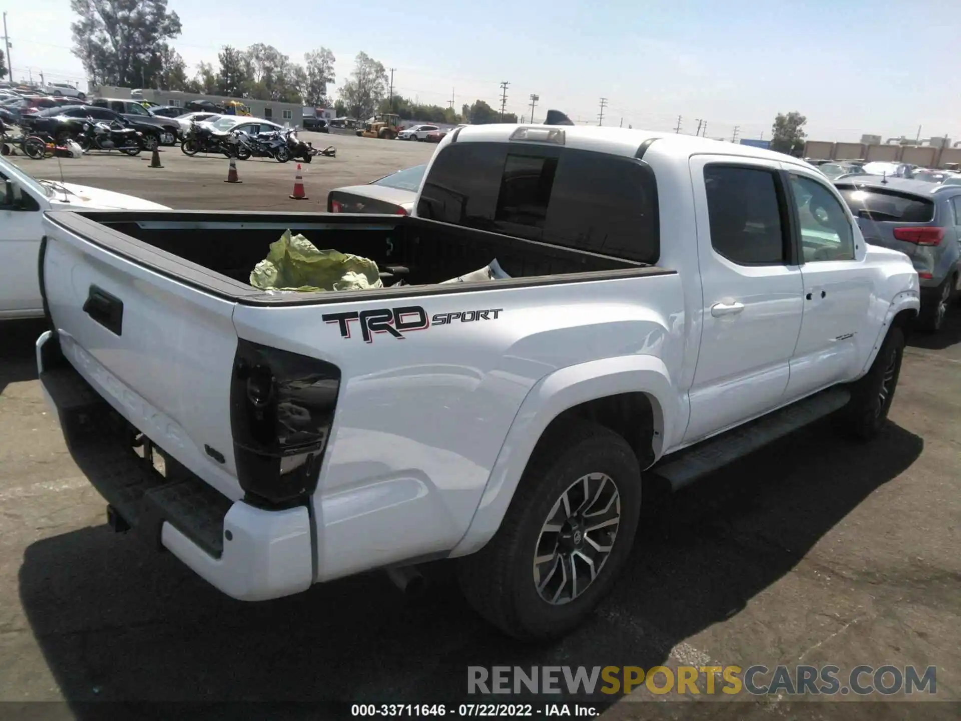 4 Photograph of a damaged car 5TFAZ5CN1MX110910 TOYOTA TACOMA 2WD 2021