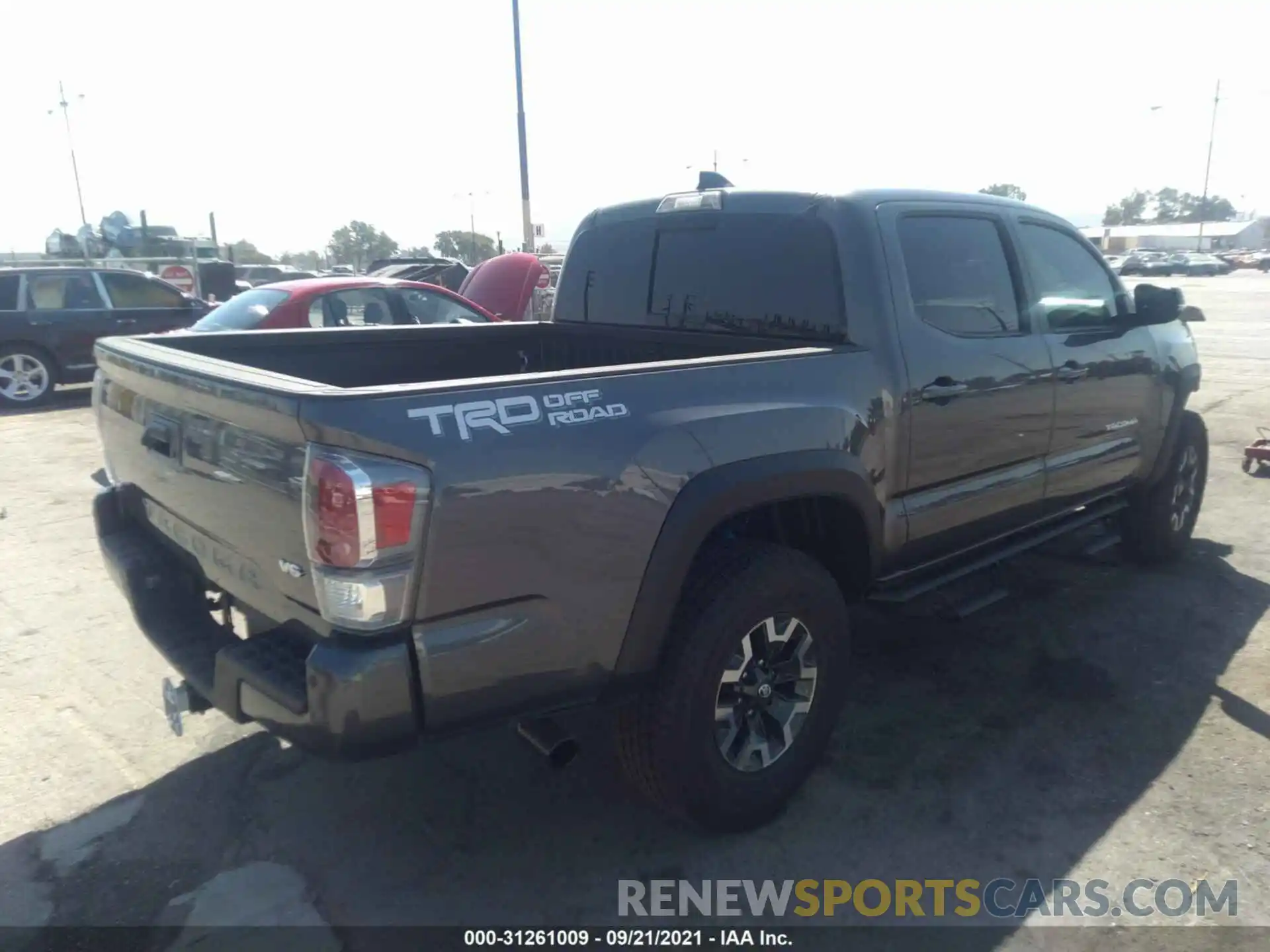 4 Photograph of a damaged car 5TFAZ5CN1MX111930 TOYOTA TACOMA 2WD 2021