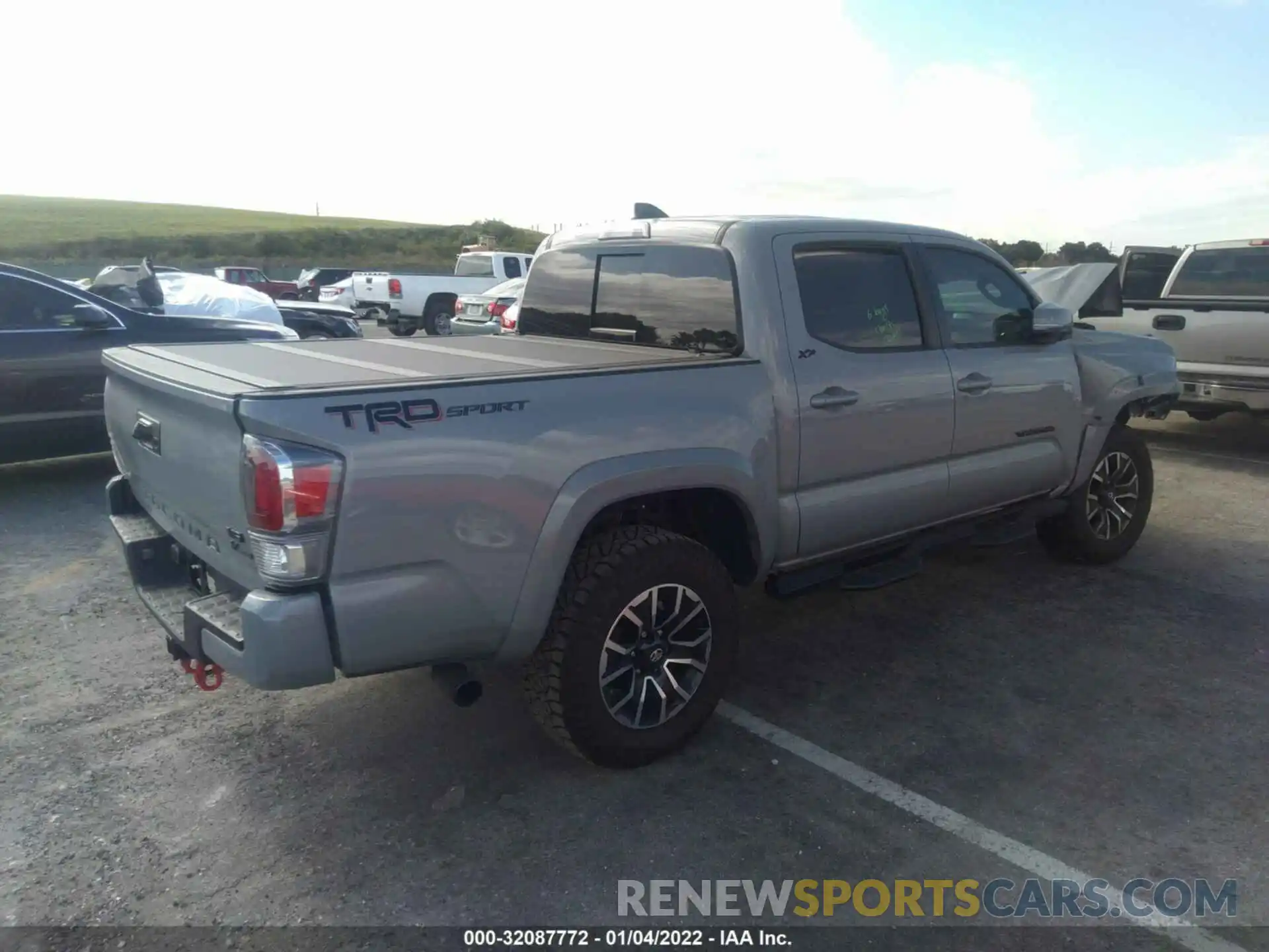 4 Photograph of a damaged car 5TFAZ5CN1MX115606 TOYOTA TACOMA 2WD 2021