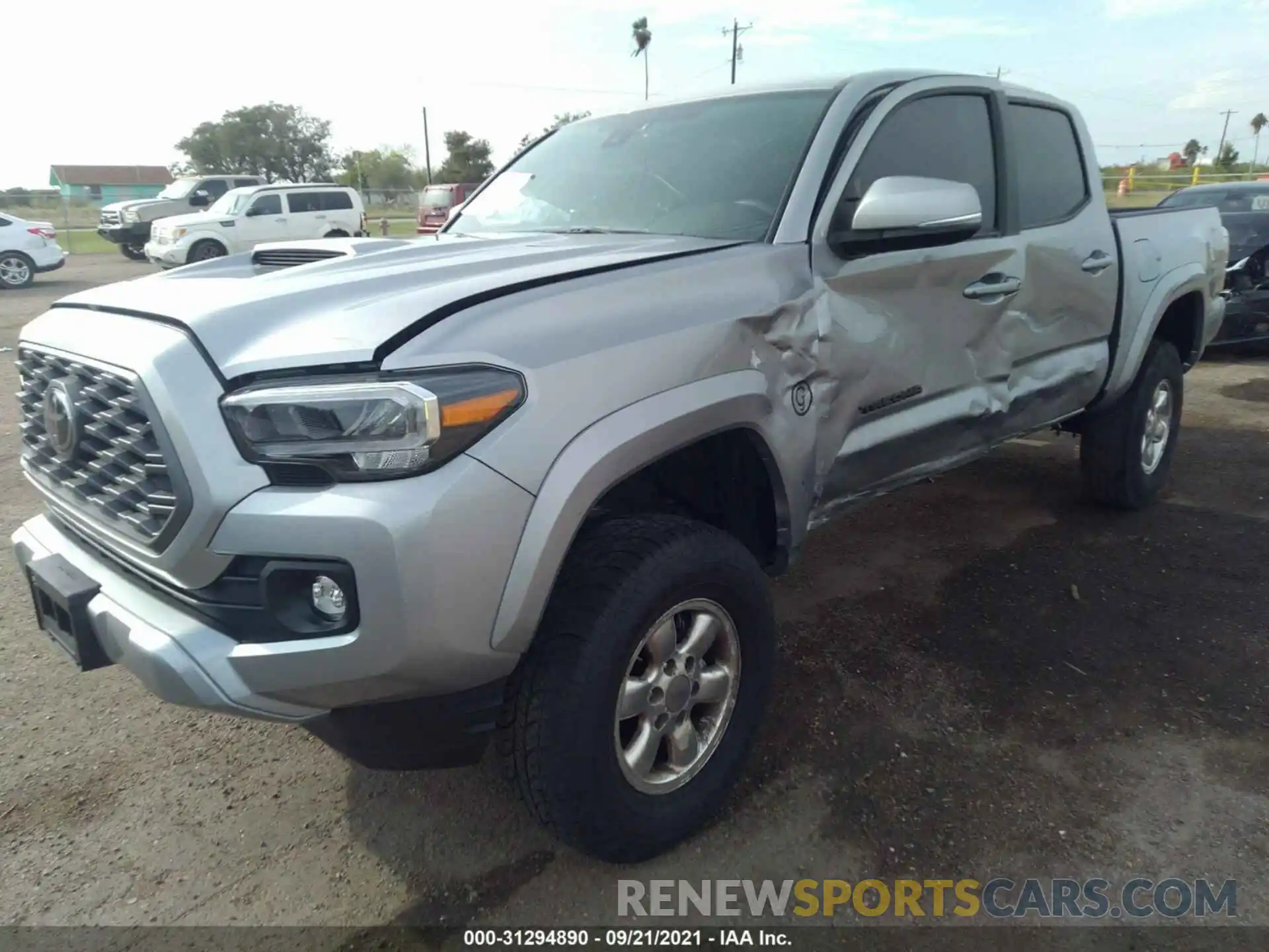 6 Photograph of a damaged car 5TFAZ5CN2MX099707 TOYOTA TACOMA 2WD 2021