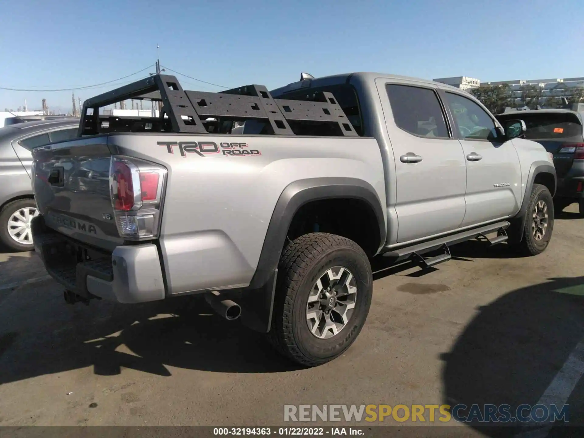 4 Photograph of a damaged car 5TFAZ5CN2MX111631 TOYOTA TACOMA 2WD 2021