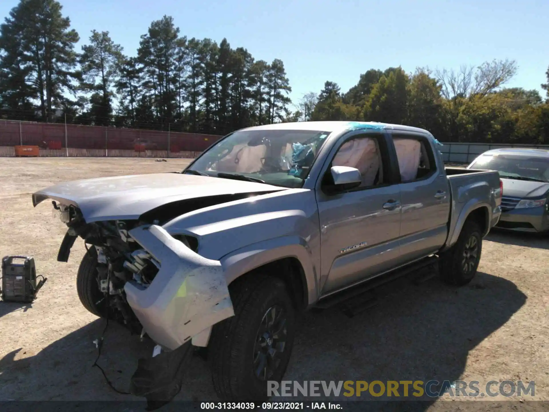 2 Photograph of a damaged car 5TFAZ5CN3MX103537 TOYOTA TACOMA 2WD 2021