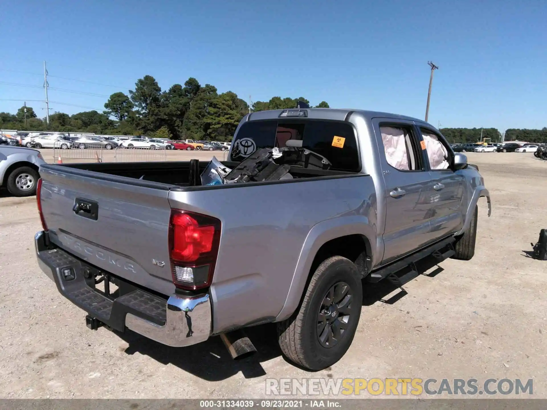 4 Photograph of a damaged car 5TFAZ5CN3MX103537 TOYOTA TACOMA 2WD 2021