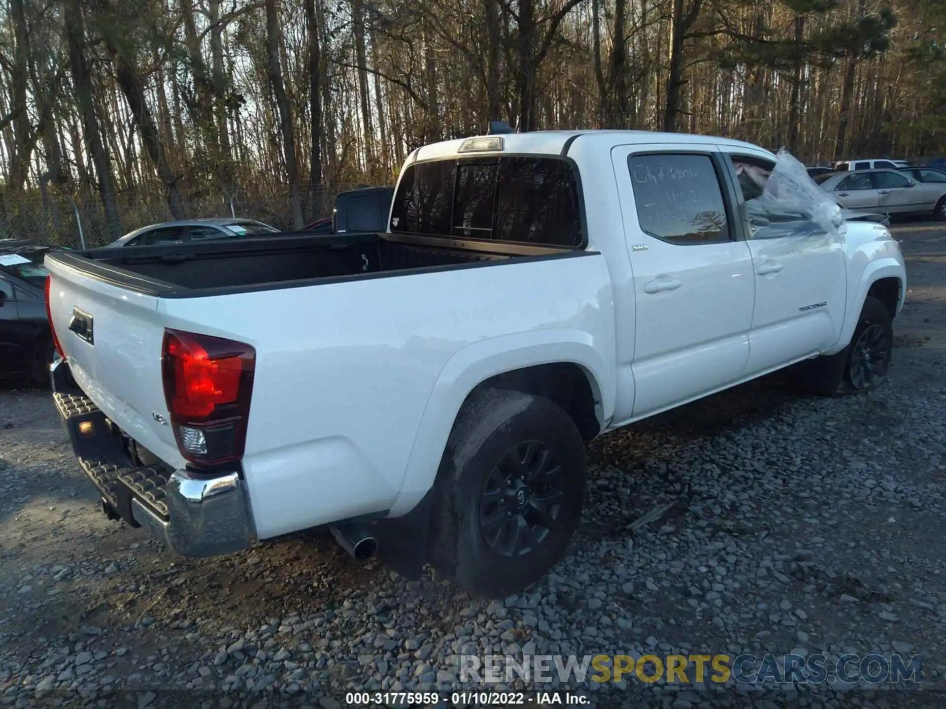 4 Photograph of a damaged car 5TFAZ5CN3MX110746 TOYOTA TACOMA 2WD 2021