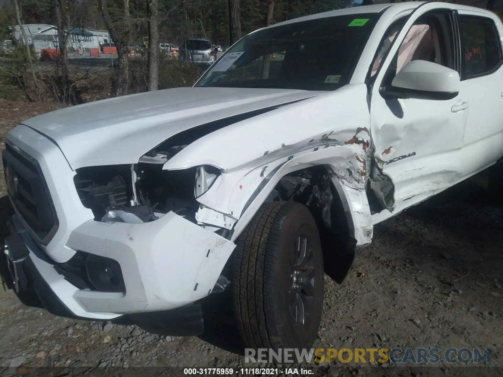 6 Photograph of a damaged car 5TFAZ5CN3MX110746 TOYOTA TACOMA 2WD 2021