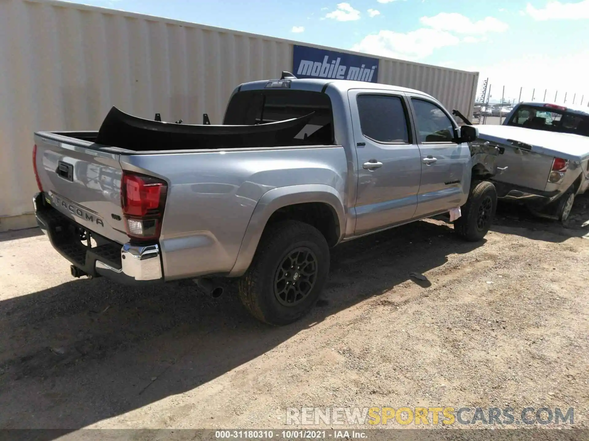 4 Photograph of a damaged car 5TFAZ5CN3MX111430 TOYOTA TACOMA 2WD 2021