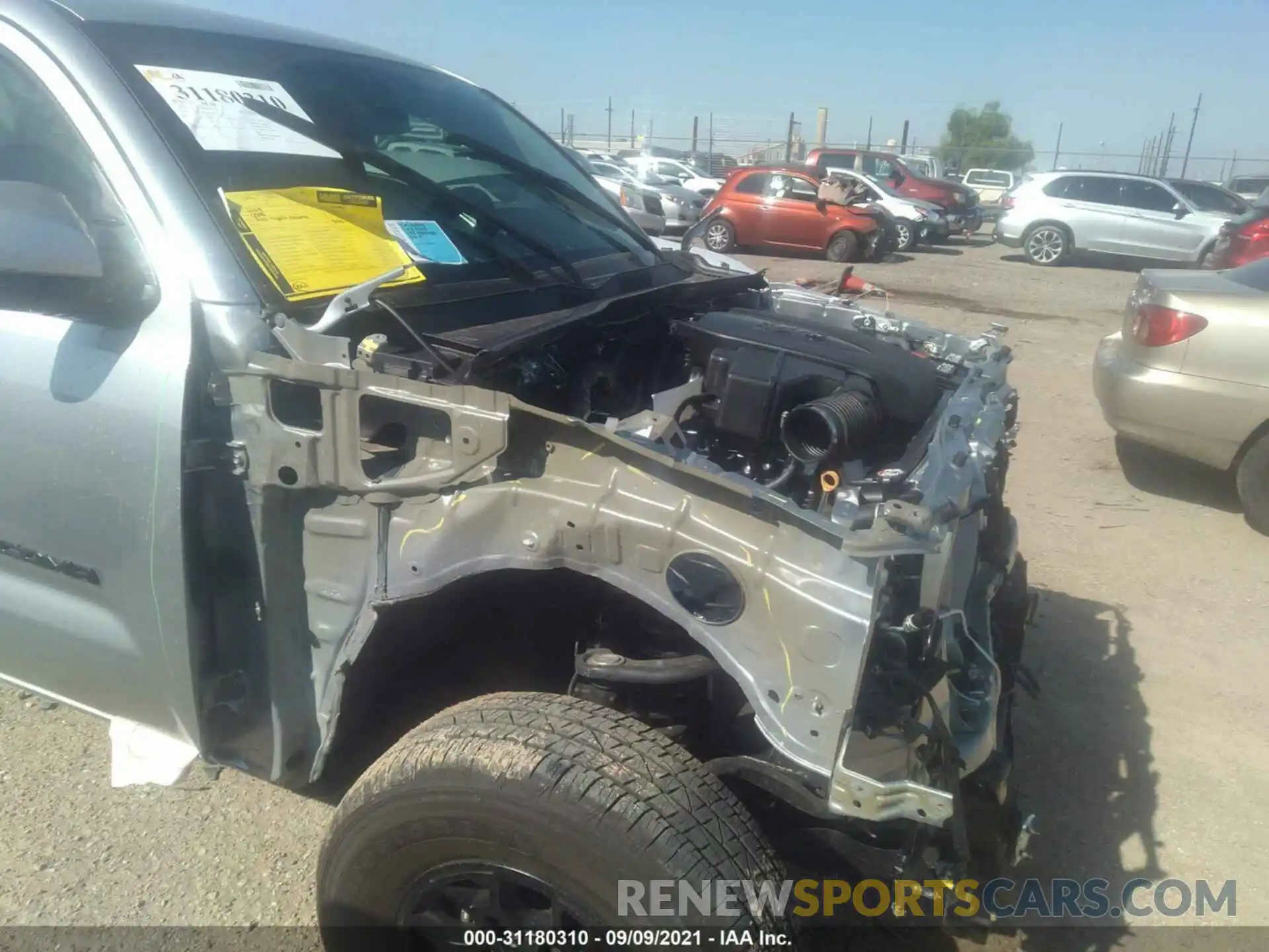 6 Photograph of a damaged car 5TFAZ5CN3MX111430 TOYOTA TACOMA 2WD 2021