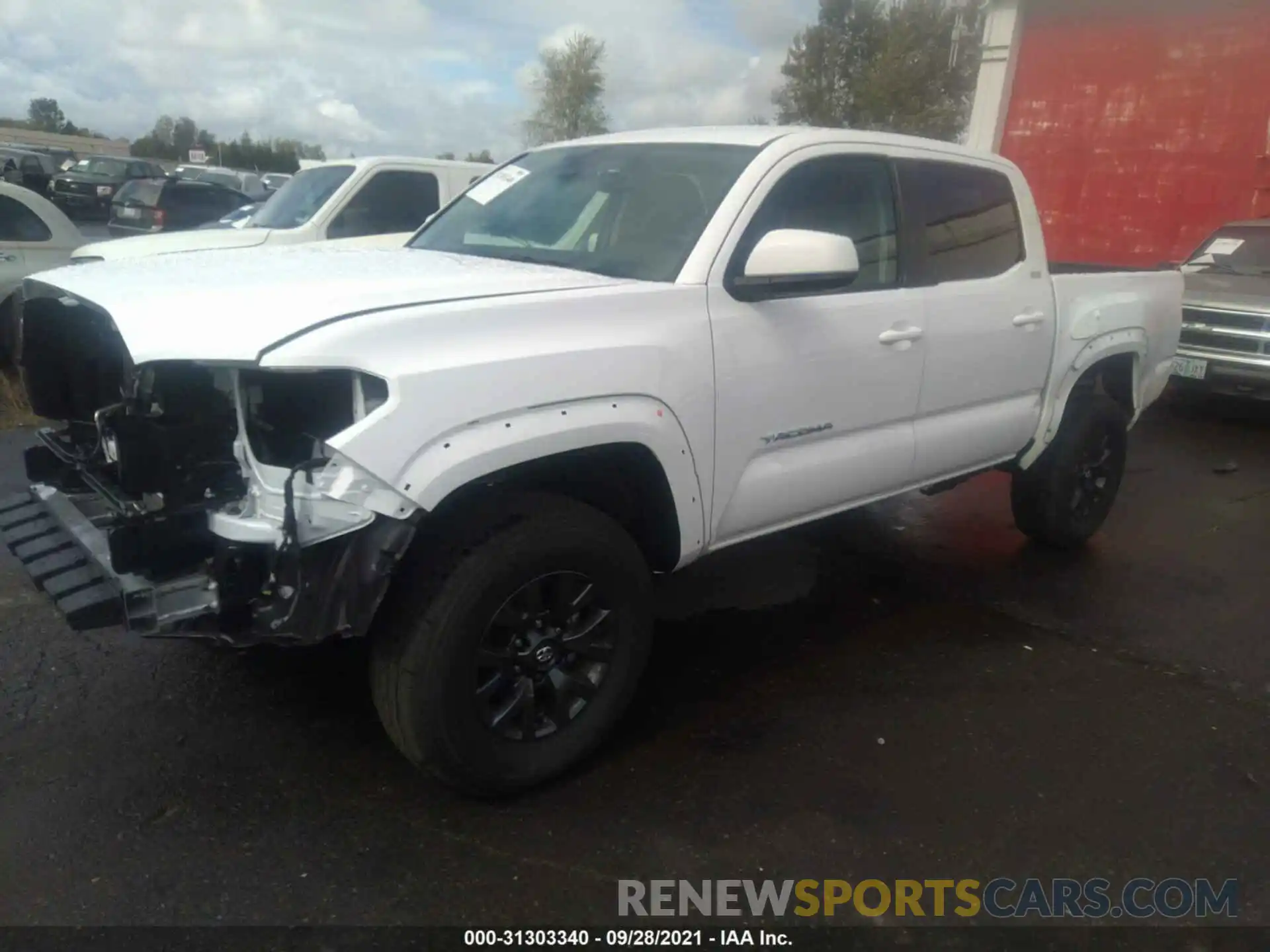 2 Photograph of a damaged car 5TFAZ5CN3MX112500 TOYOTA TACOMA 2WD 2021