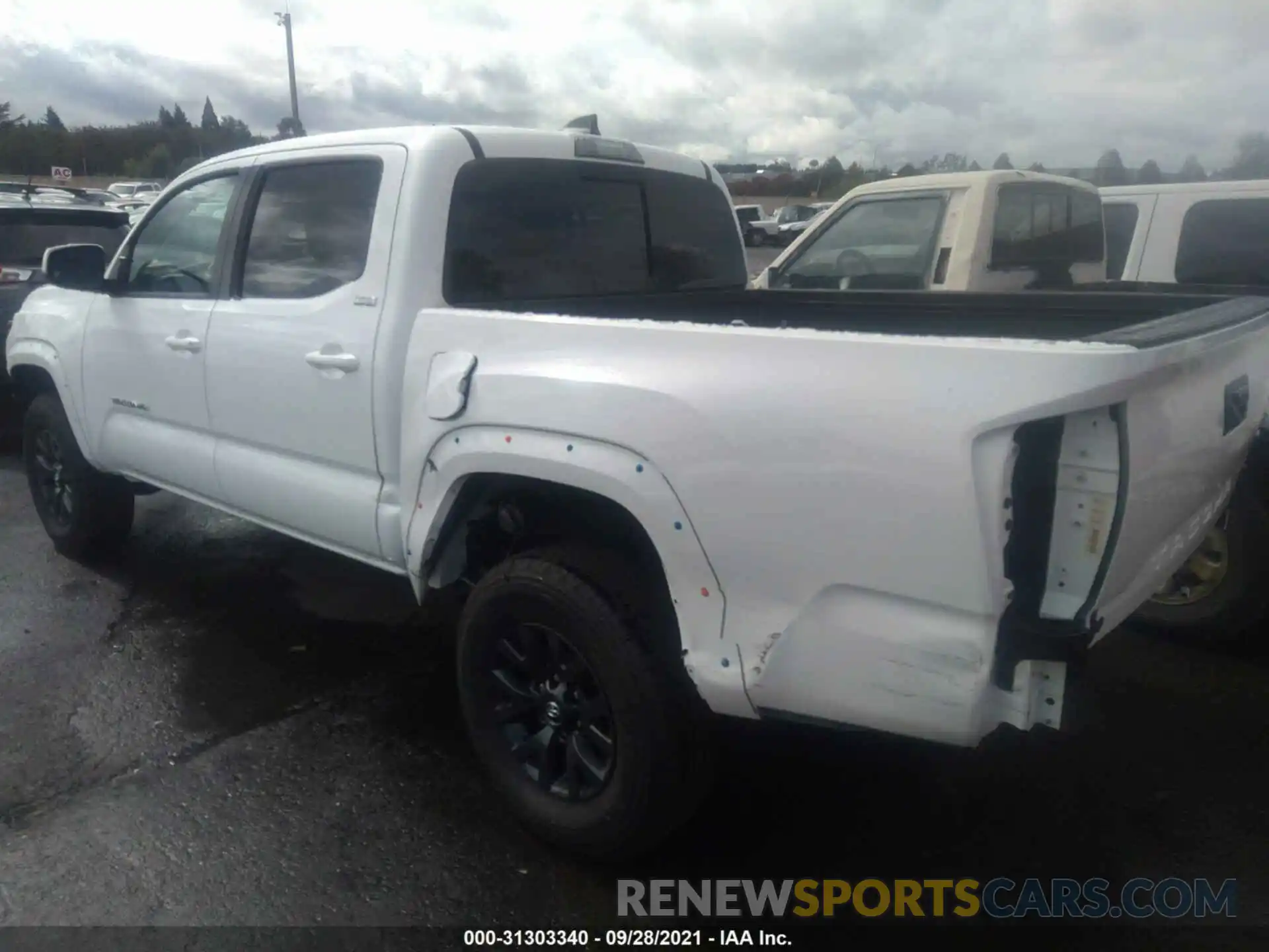 3 Photograph of a damaged car 5TFAZ5CN3MX112500 TOYOTA TACOMA 2WD 2021