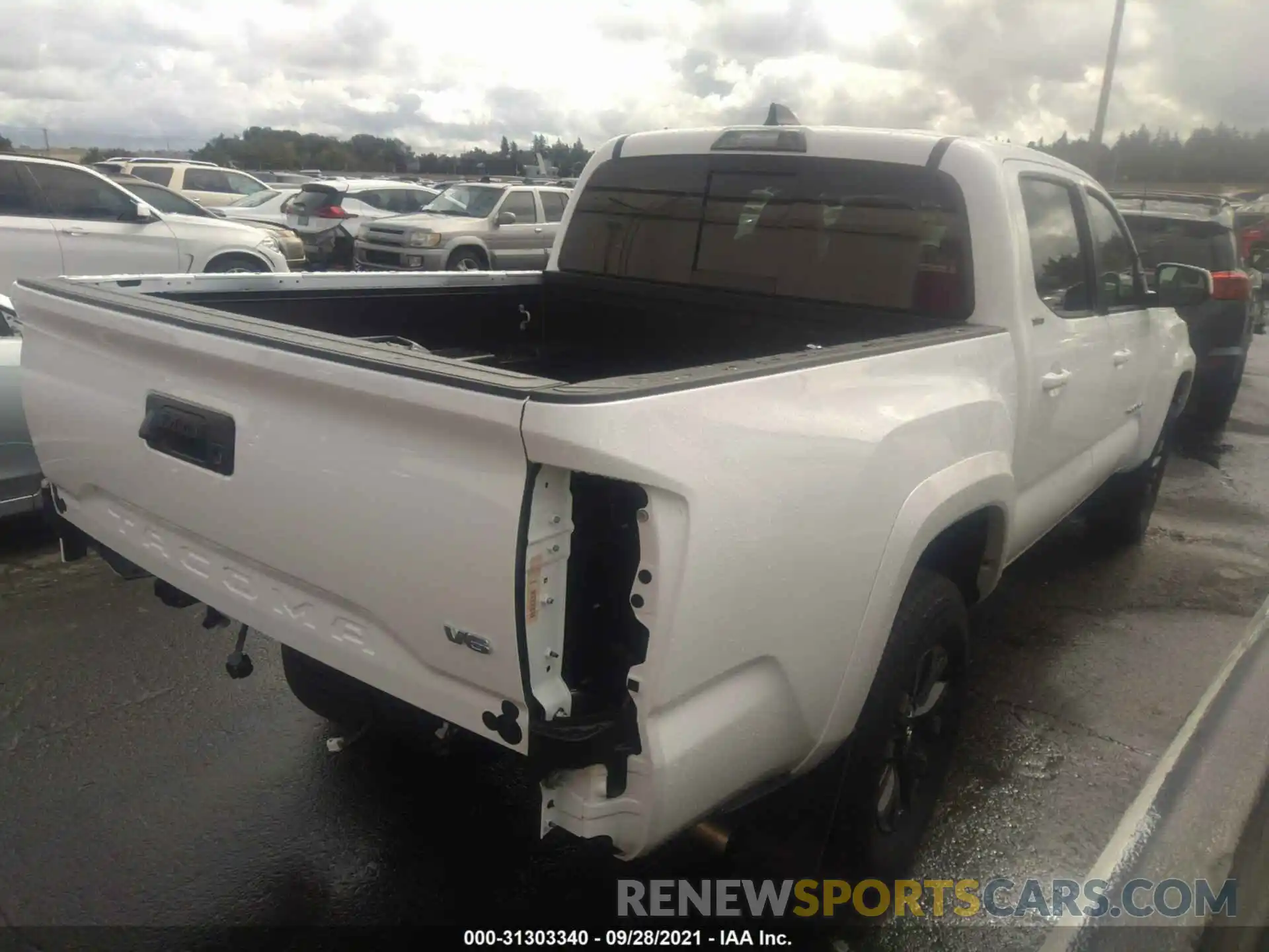 4 Photograph of a damaged car 5TFAZ5CN3MX112500 TOYOTA TACOMA 2WD 2021