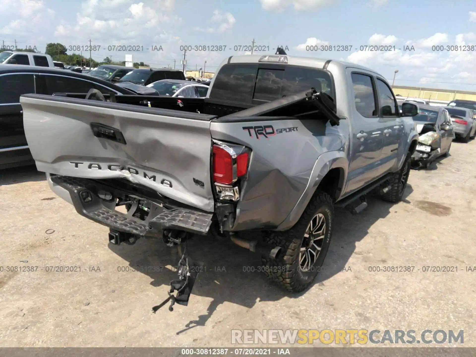 4 Photograph of a damaged car 5TFAZ5CN4MX097649 TOYOTA TACOMA 2WD 2021