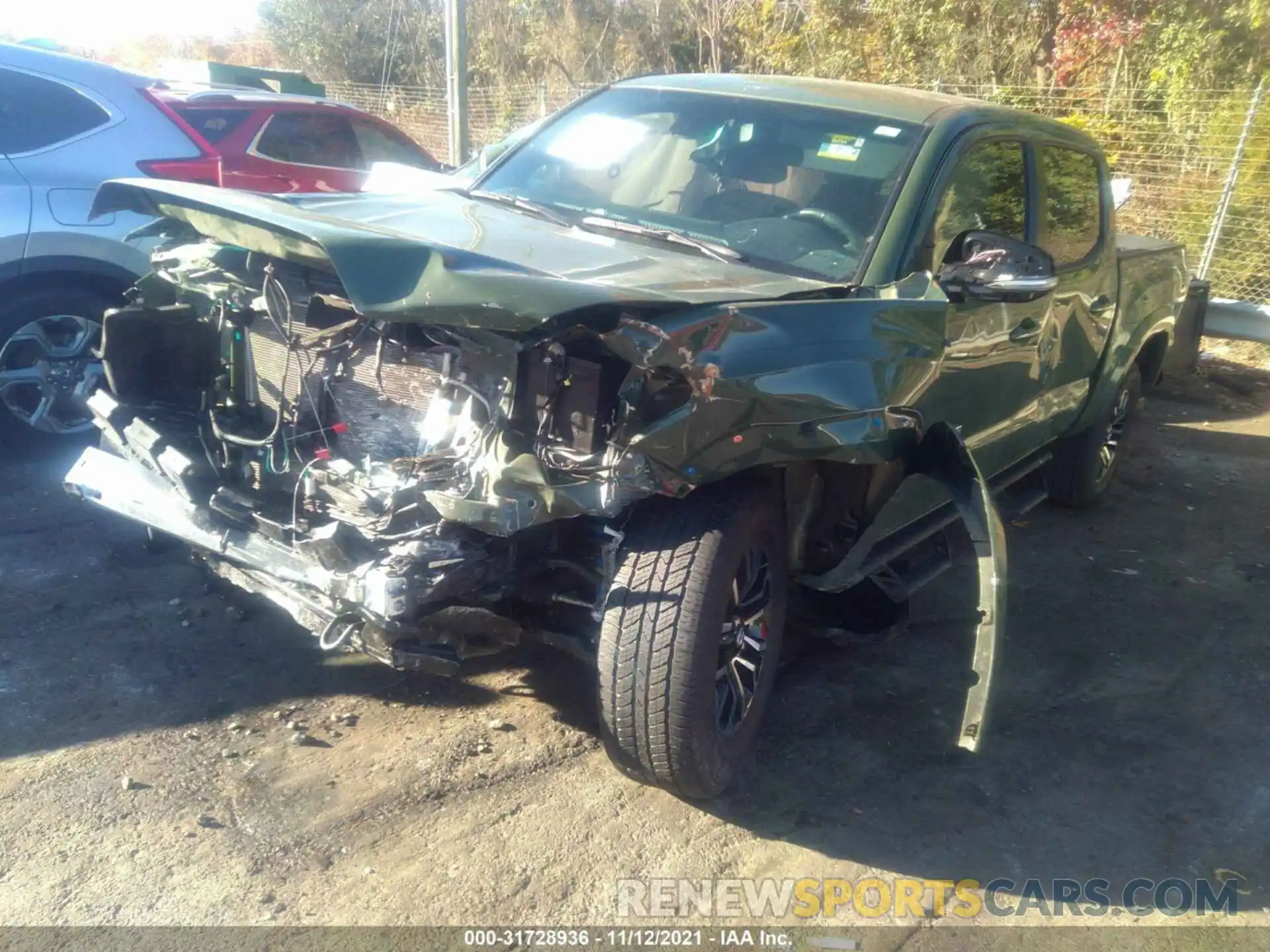 2 Photograph of a damaged car 5TFAZ5CN4MX099501 TOYOTA TACOMA 2WD 2021