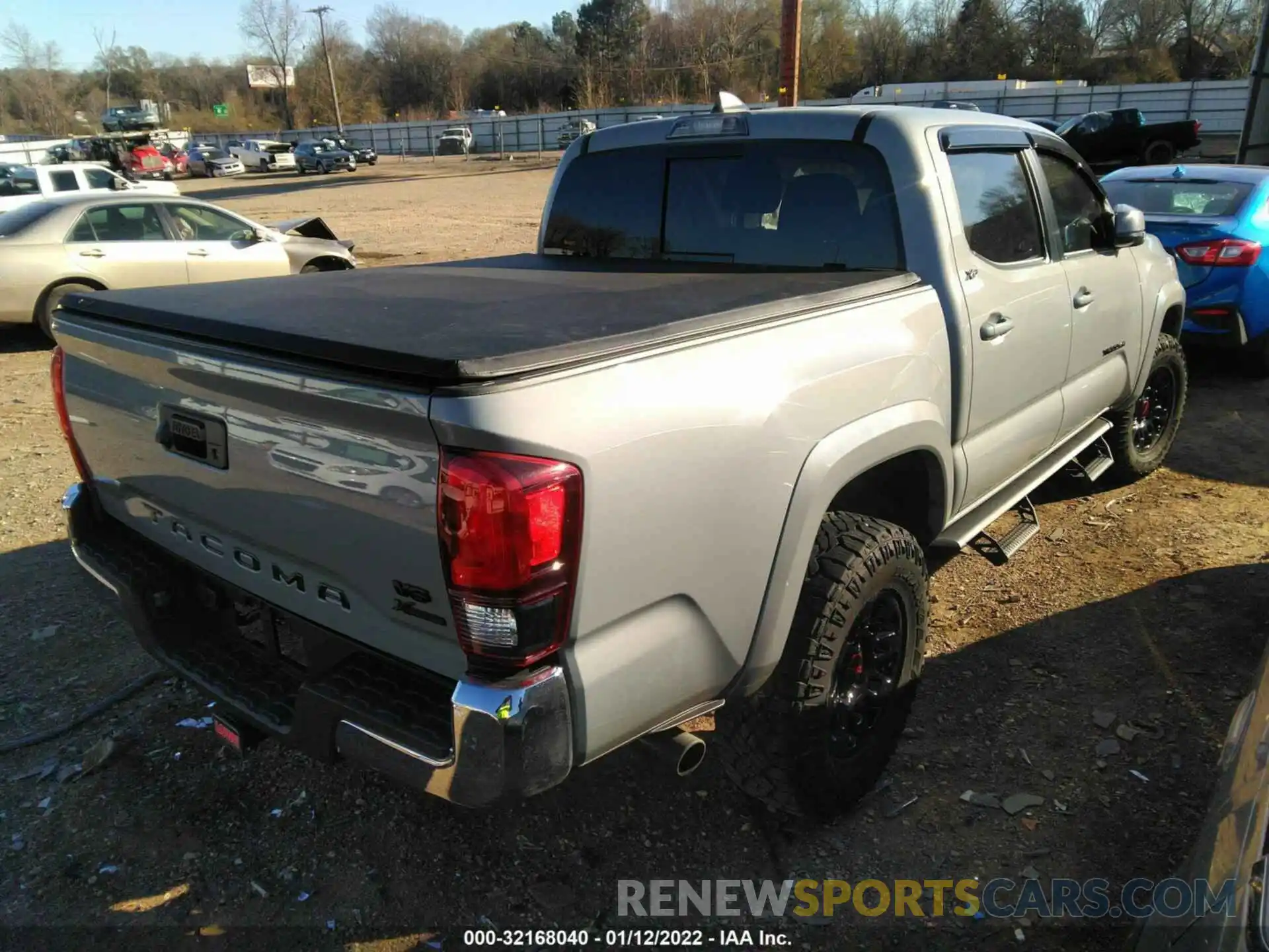 4 Photograph of a damaged car 5TFAZ5CN4MX110321 TOYOTA TACOMA 2WD 2021