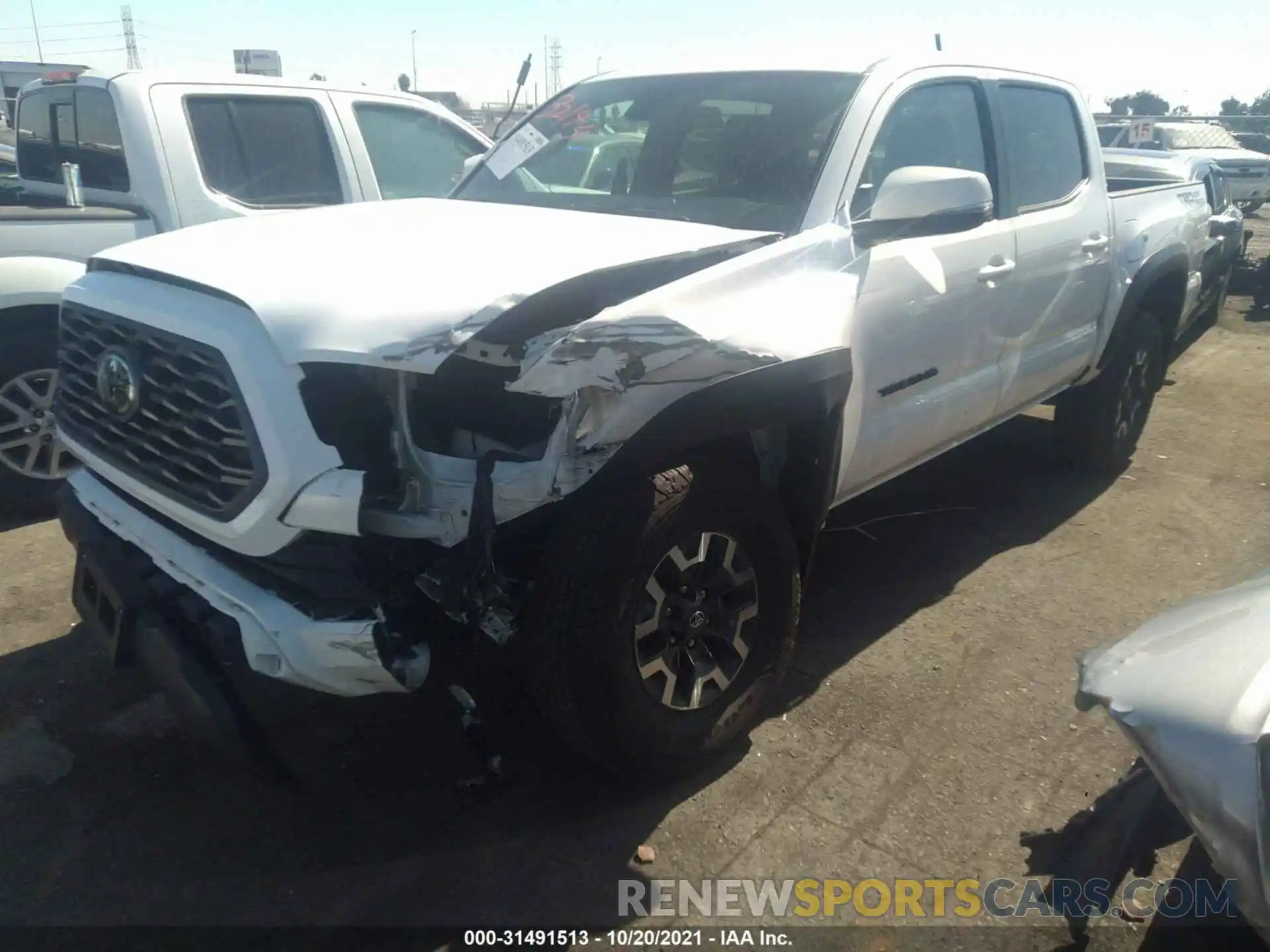 2 Photograph of a damaged car 5TFAZ5CN4MX110805 TOYOTA TACOMA 2WD 2021