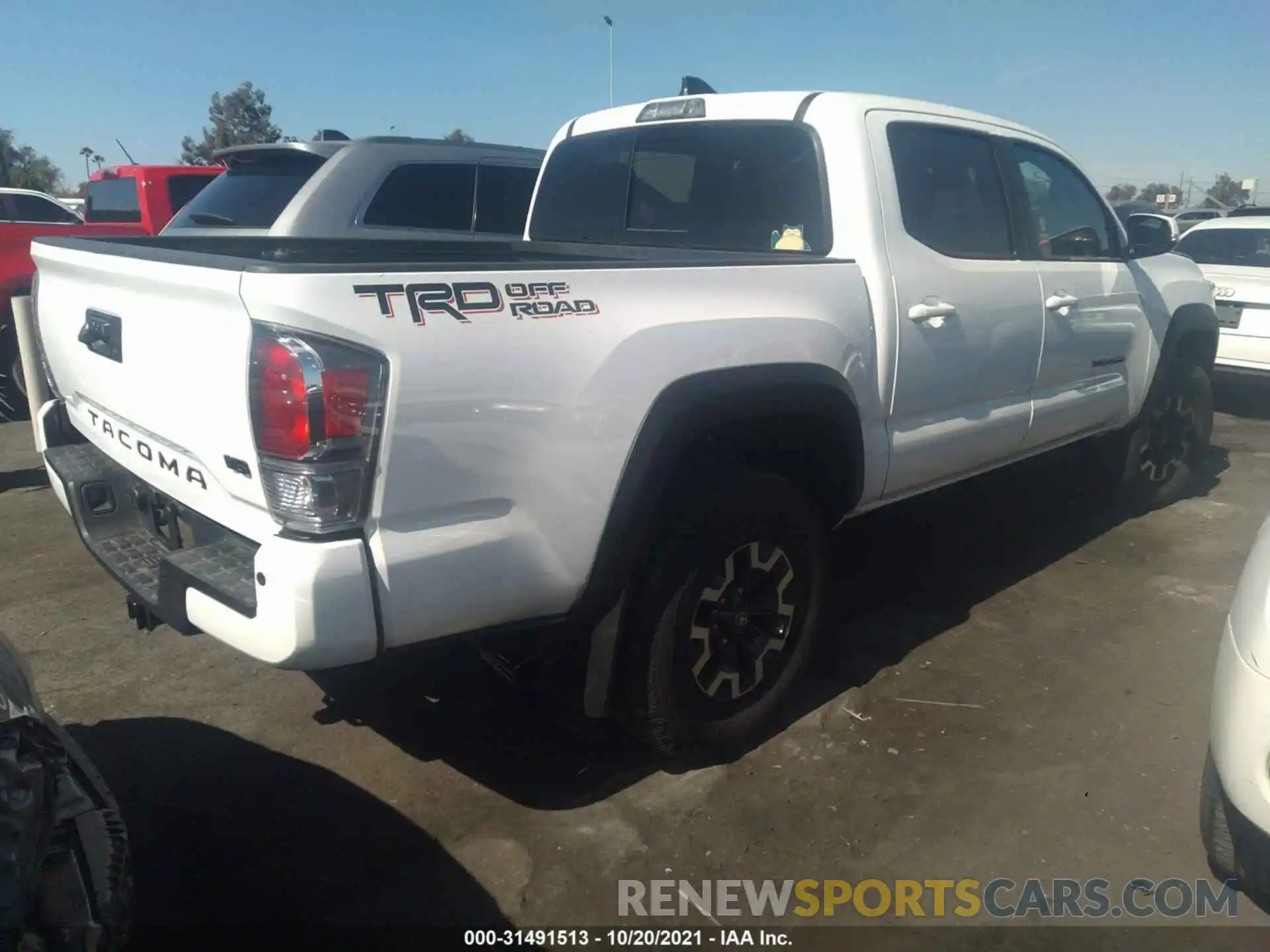 4 Photograph of a damaged car 5TFAZ5CN4MX110805 TOYOTA TACOMA 2WD 2021