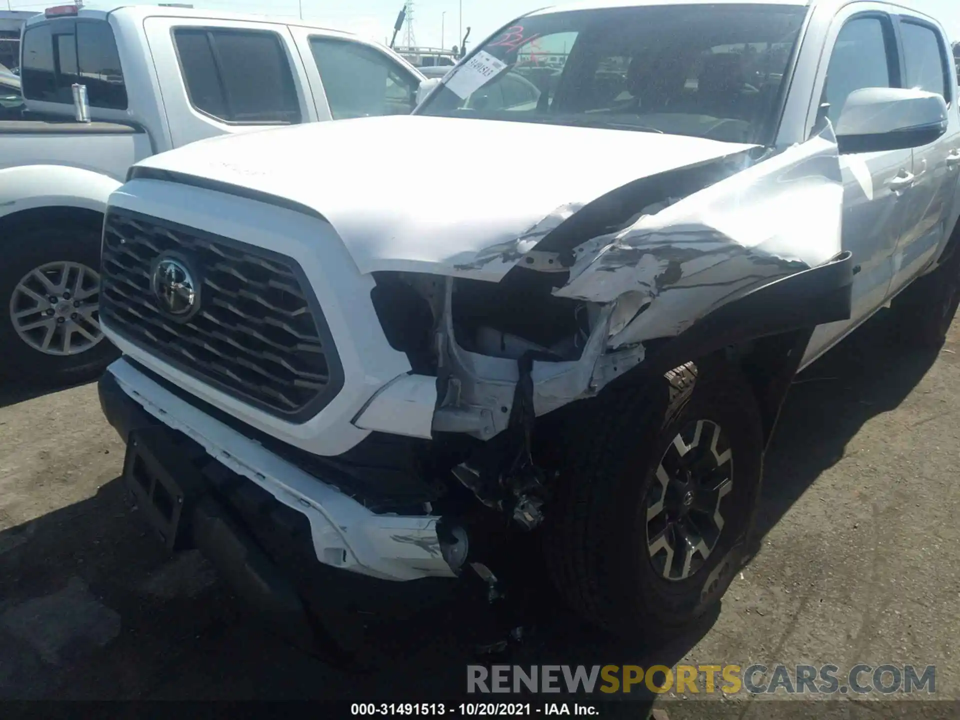 6 Photograph of a damaged car 5TFAZ5CN4MX110805 TOYOTA TACOMA 2WD 2021