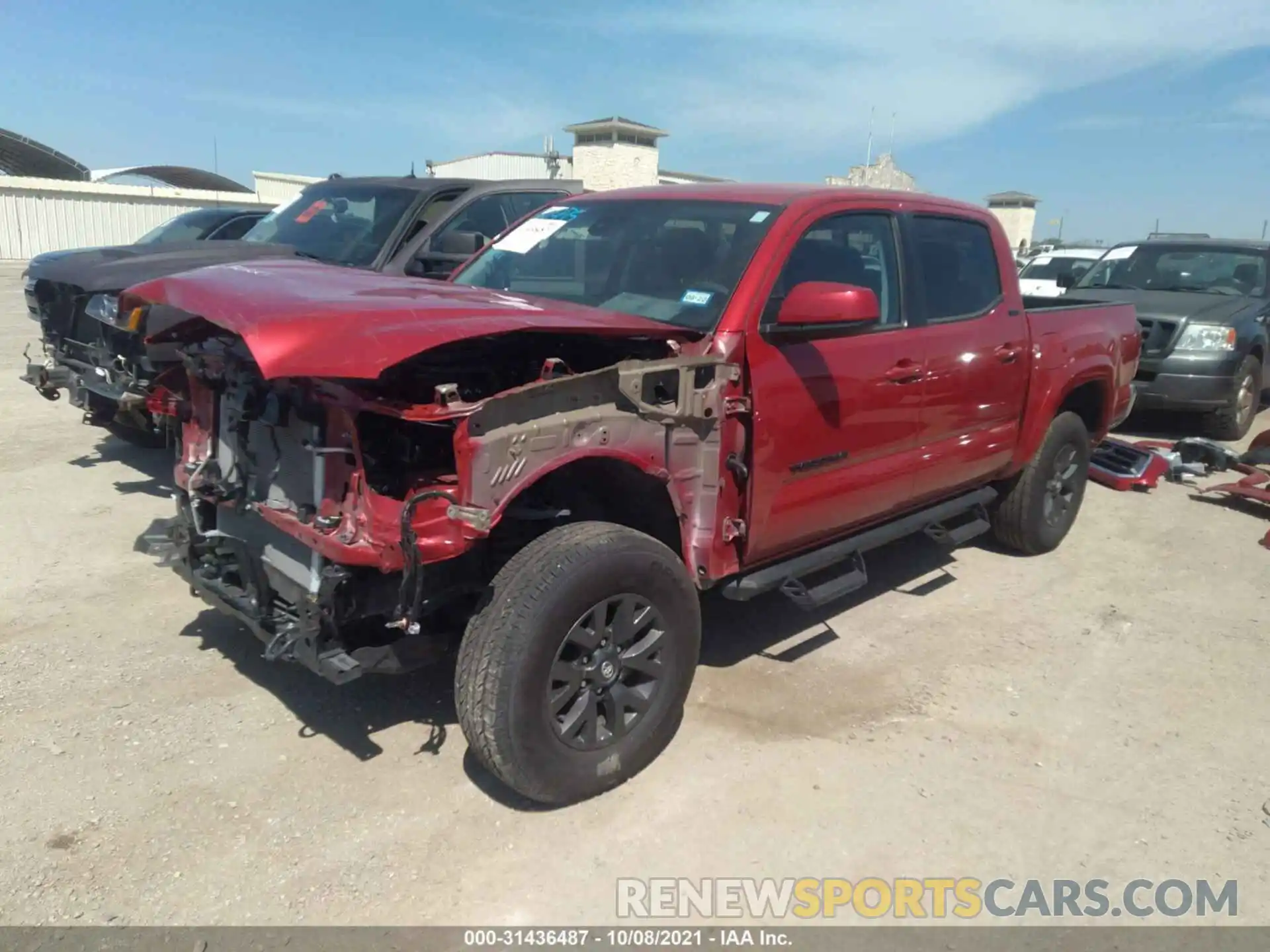 2 Photograph of a damaged car 5TFAZ5CN5MX095358 TOYOTA TACOMA 2WD 2021