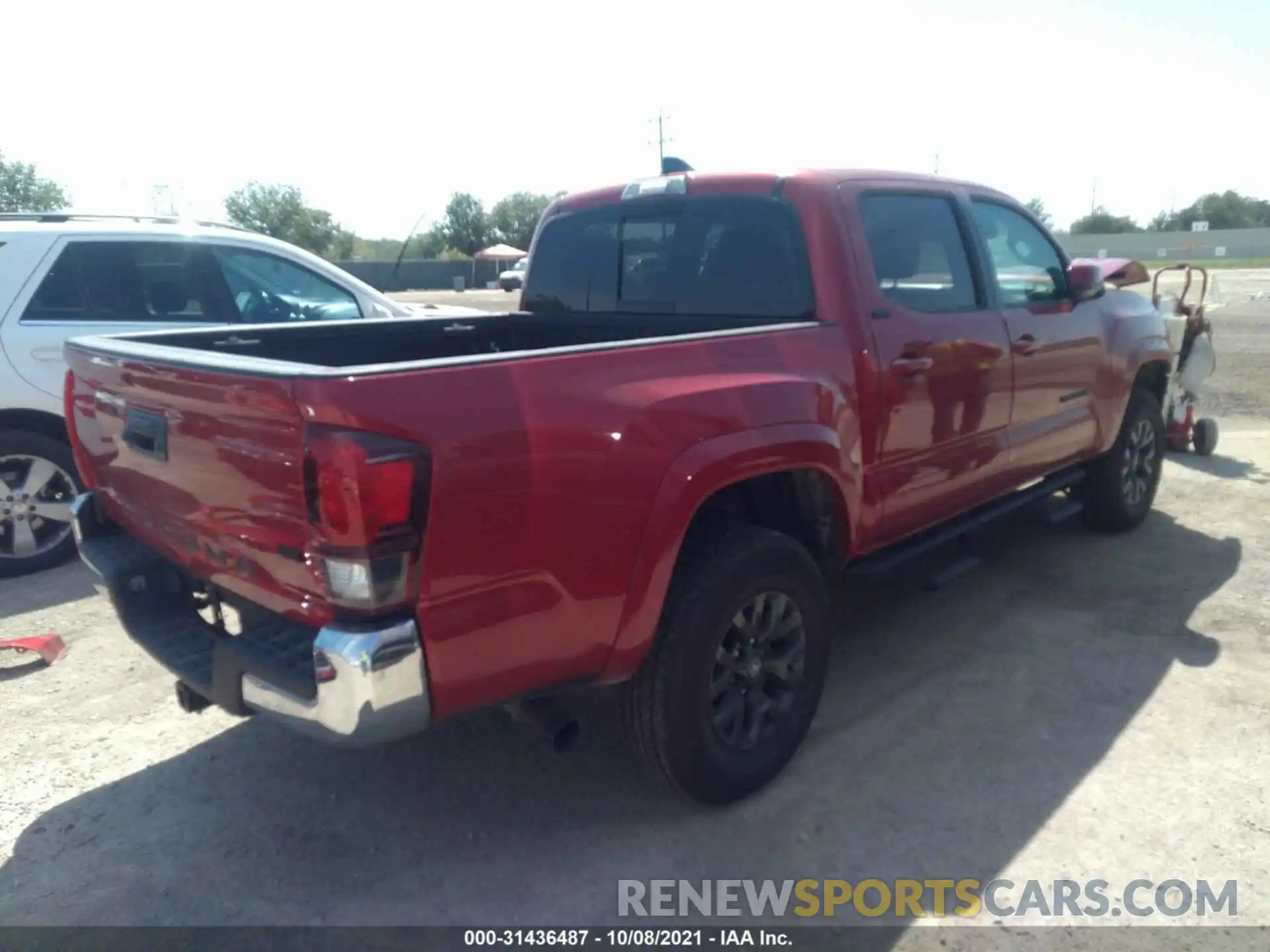 4 Photograph of a damaged car 5TFAZ5CN5MX095358 TOYOTA TACOMA 2WD 2021