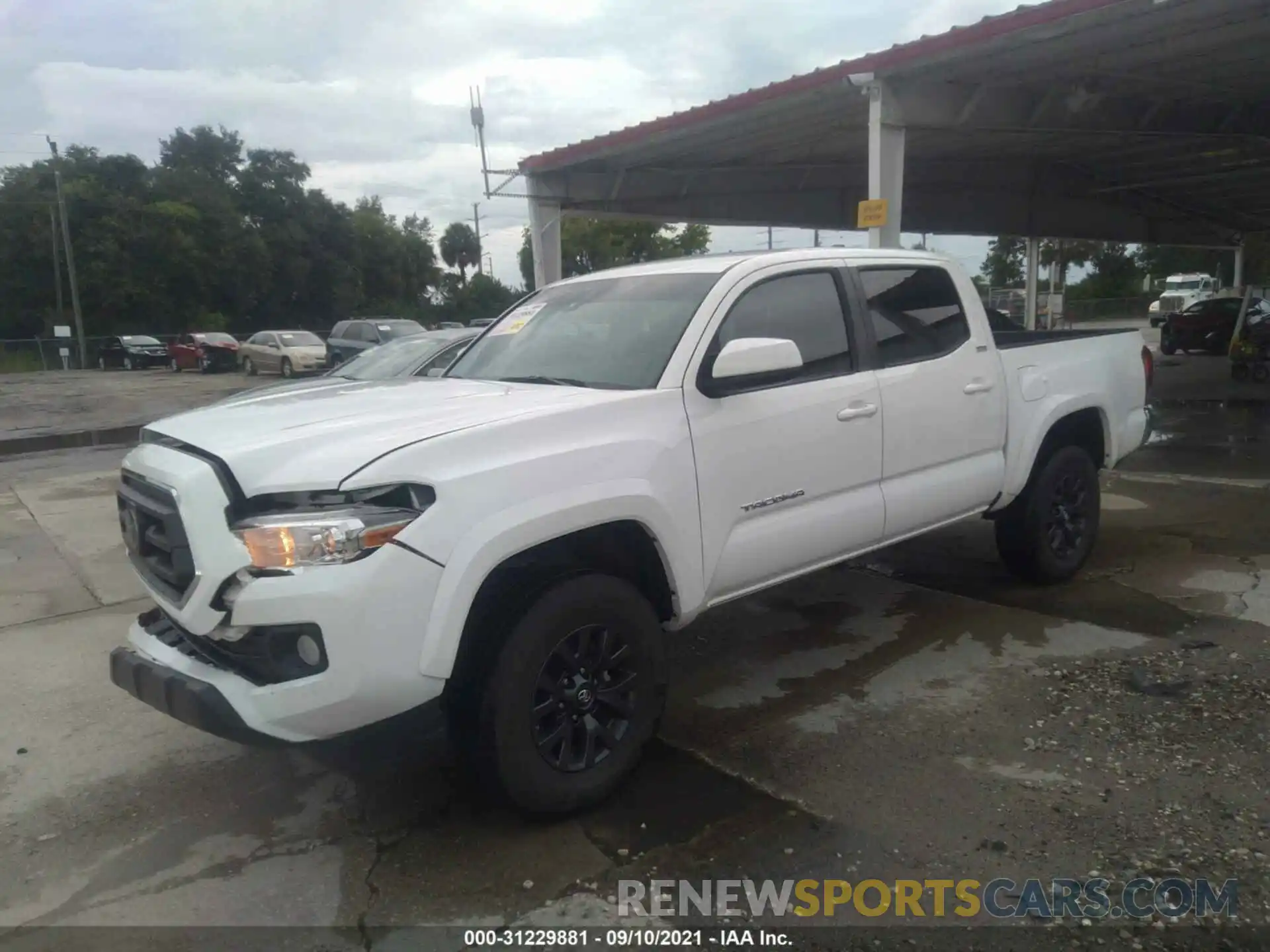 2 Photograph of a damaged car 5TFAZ5CN5MX097370 TOYOTA TACOMA 2WD 2021