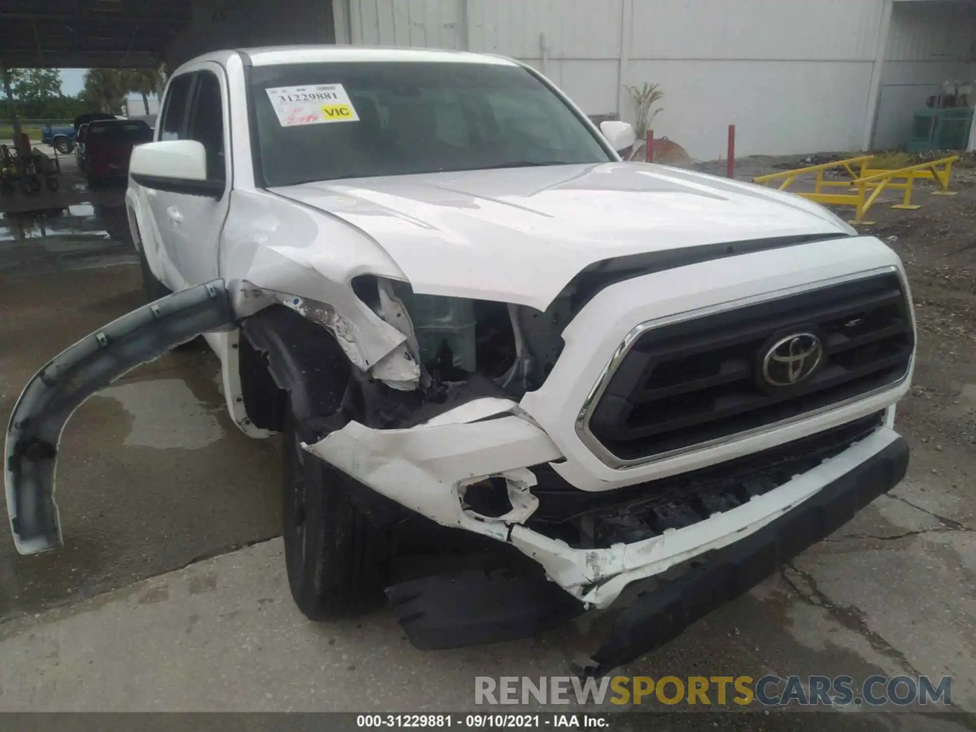 6 Photograph of a damaged car 5TFAZ5CN5MX097370 TOYOTA TACOMA 2WD 2021