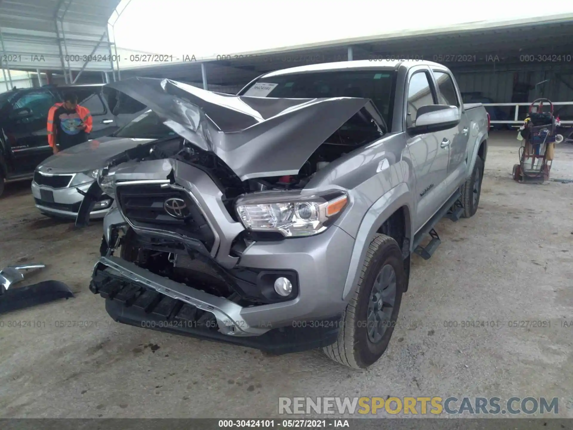 2 Photograph of a damaged car 5TFAZ5CN5MX097773 TOYOTA TACOMA 2WD 2021